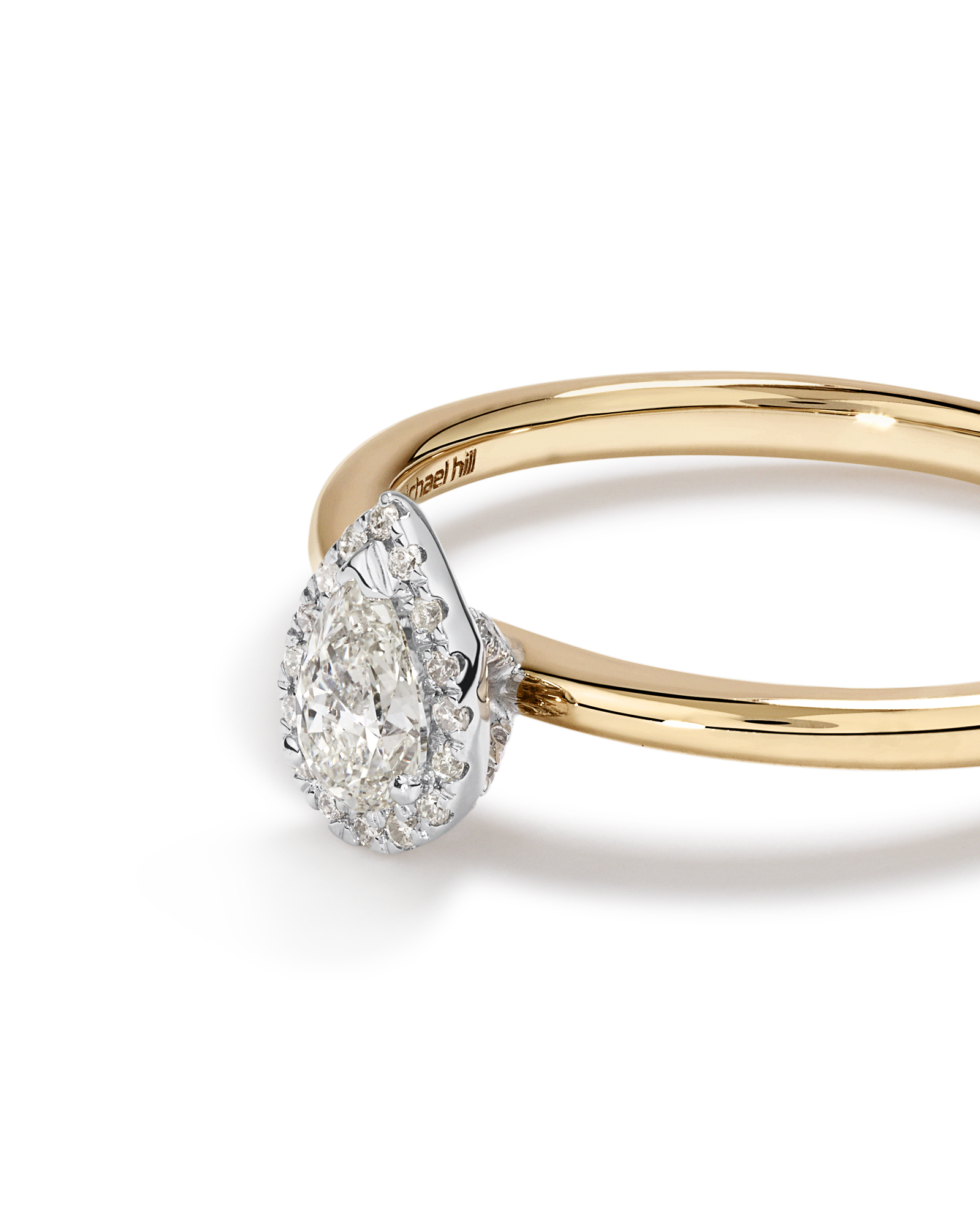 0.31 Carat TW Pear Cut Diamond Halo Engagement Ring in 14kt Yellow and White Gold