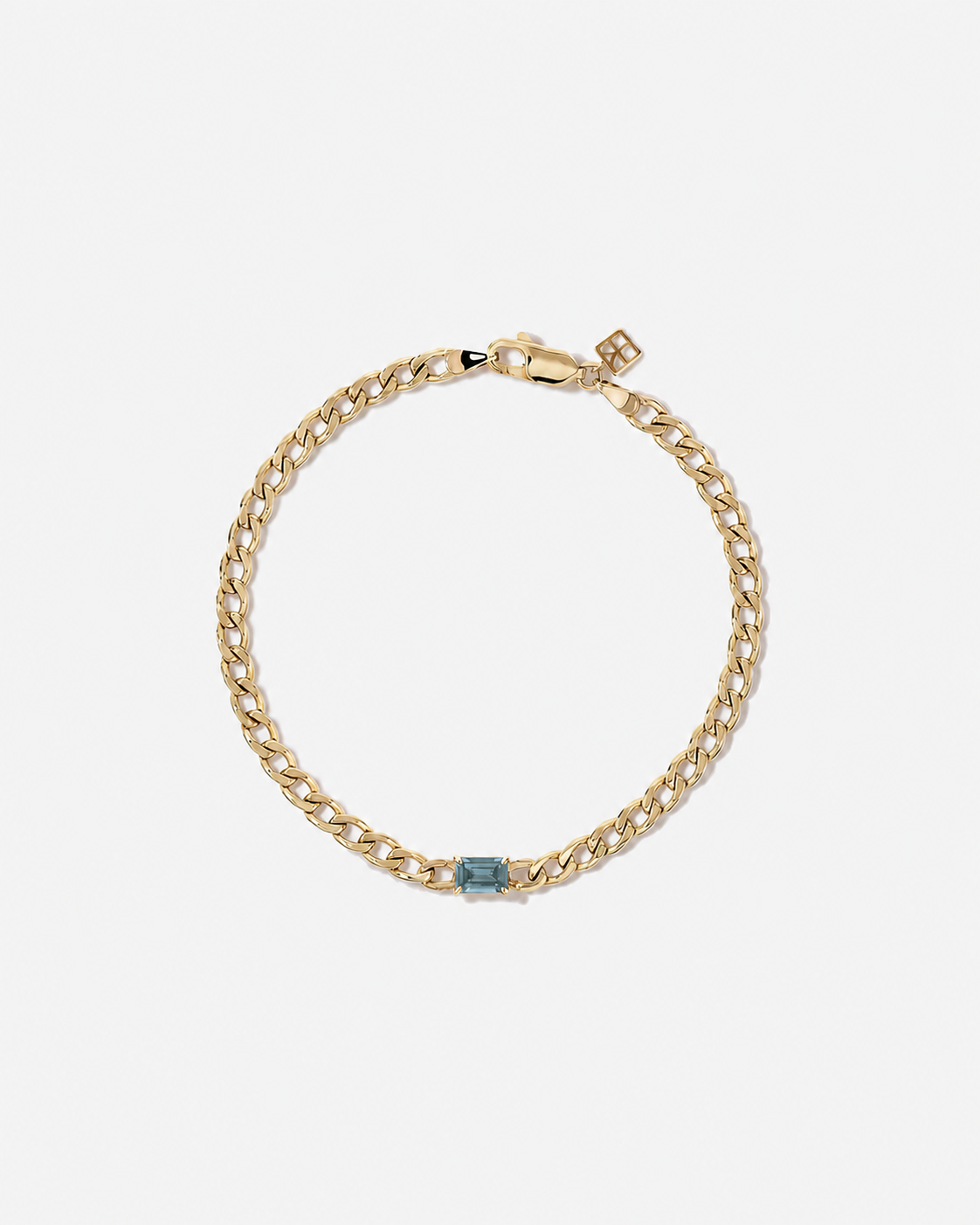 Blue Topaz Curb Link Bracelet in 10kt Yellow Gold