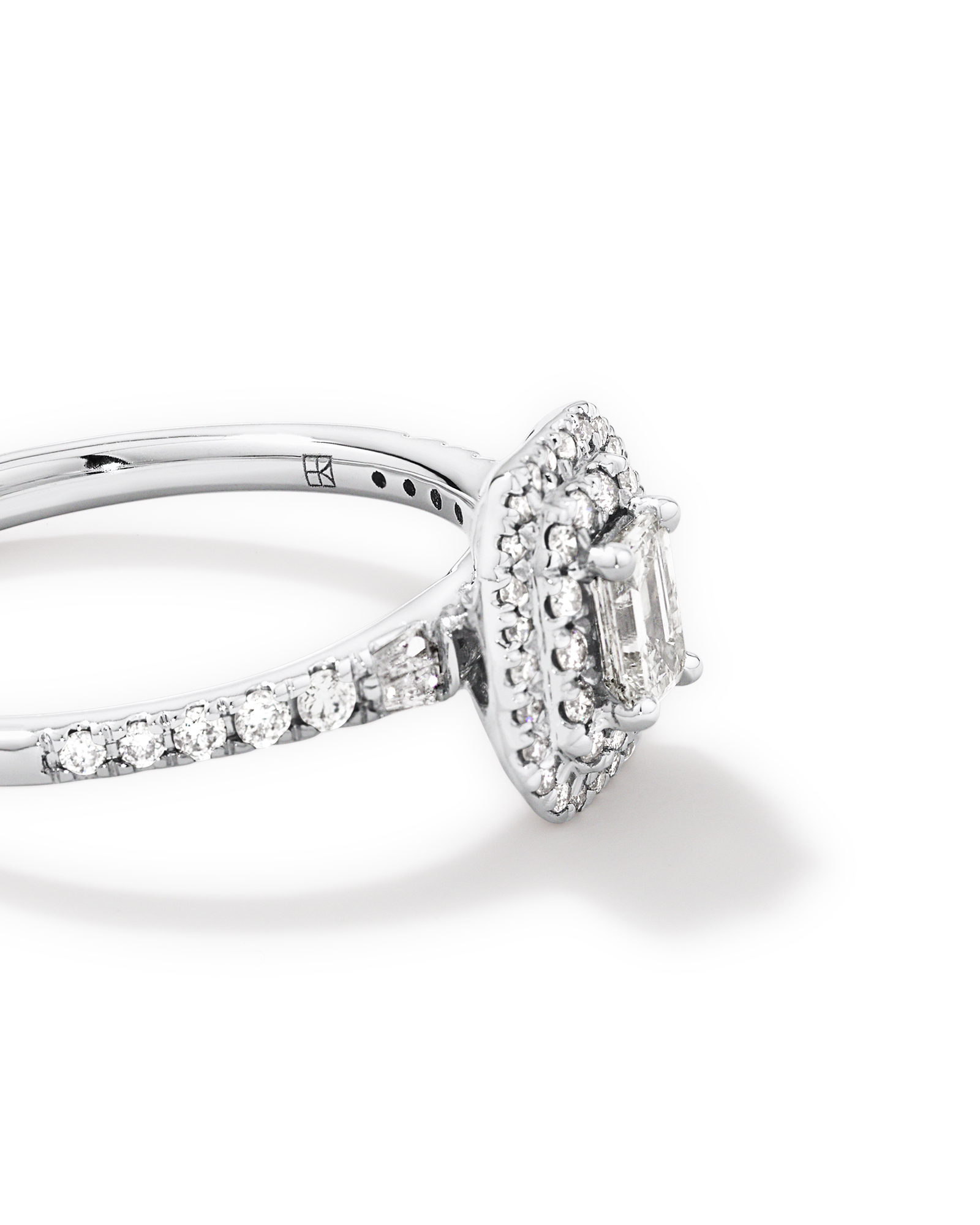 0.55 Carat TW Emerald Diamond Halo Baguette Side Accent Engagement Ring in 14kt White Gold