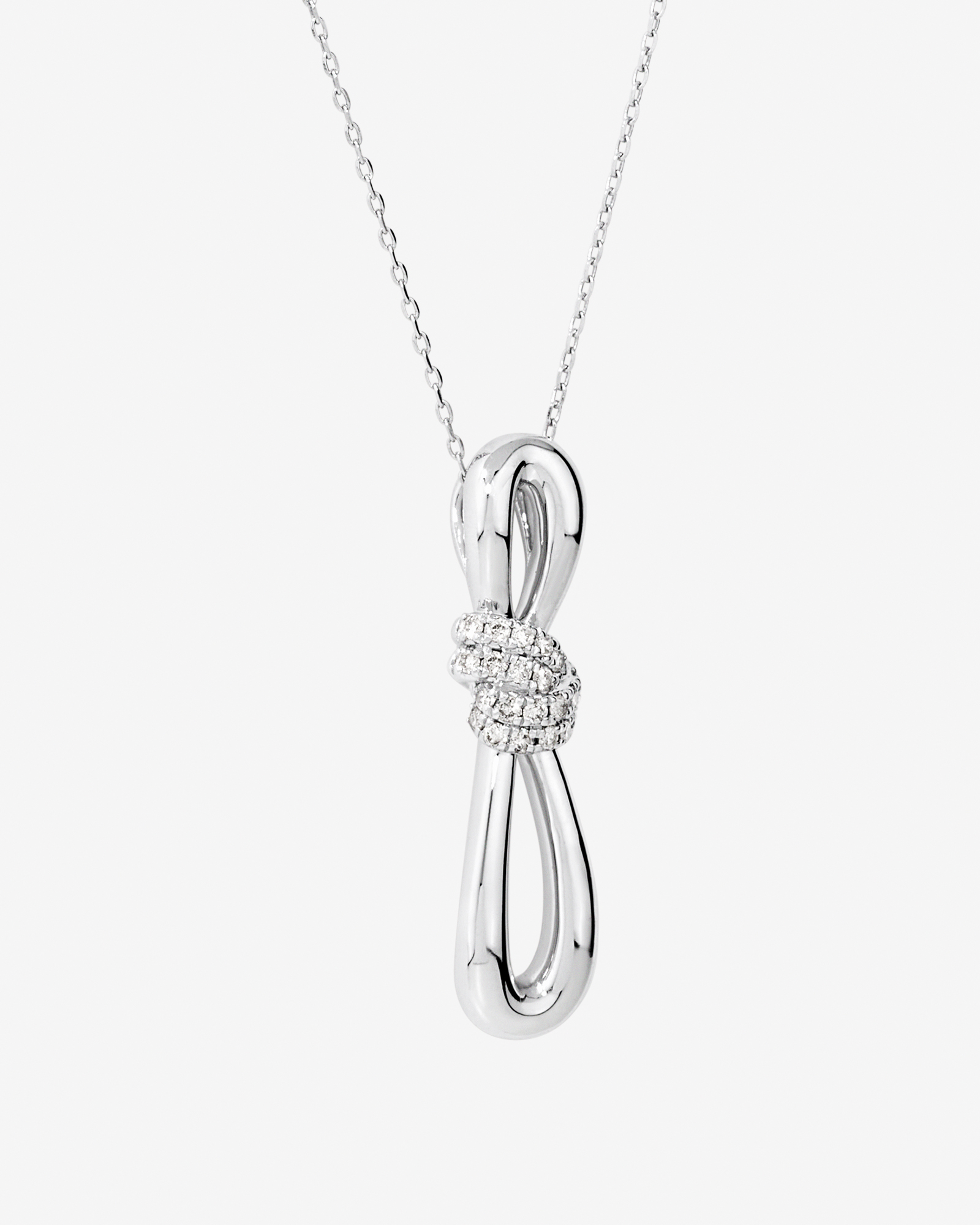 0.15 Carat TW Diamond Knots Pendant in Sterling Silver