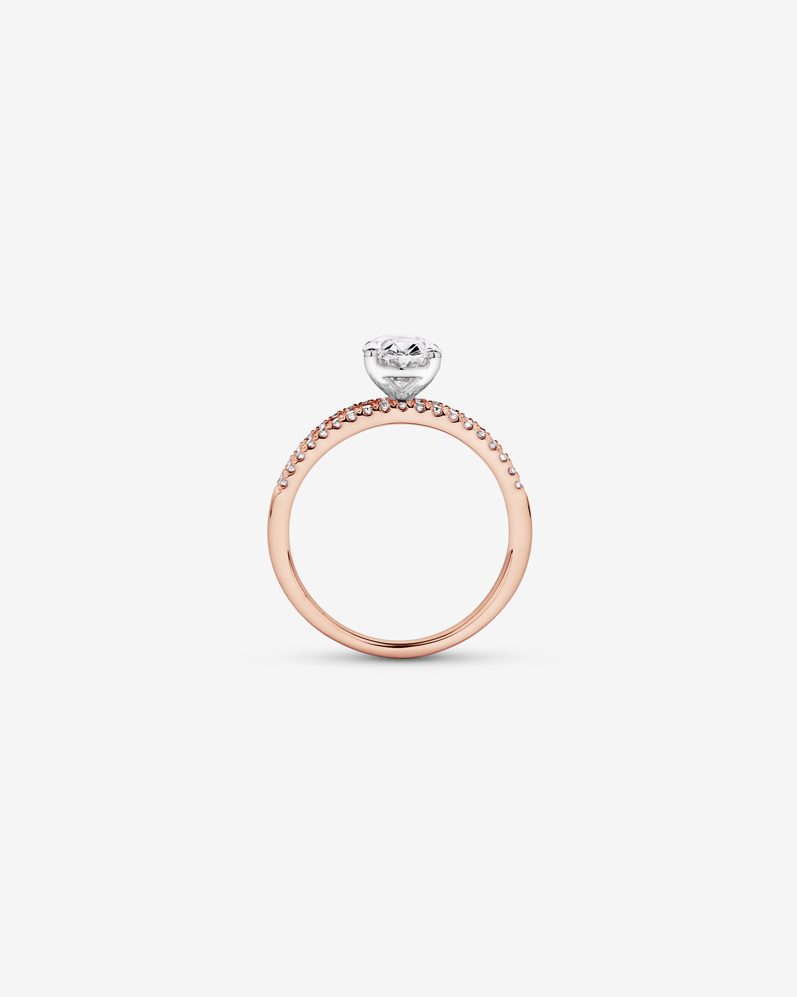 Bague en or rose et blanc 14 carats, sertie de diamants ovales baguettes synthèse d'un poids total 2,21 carats