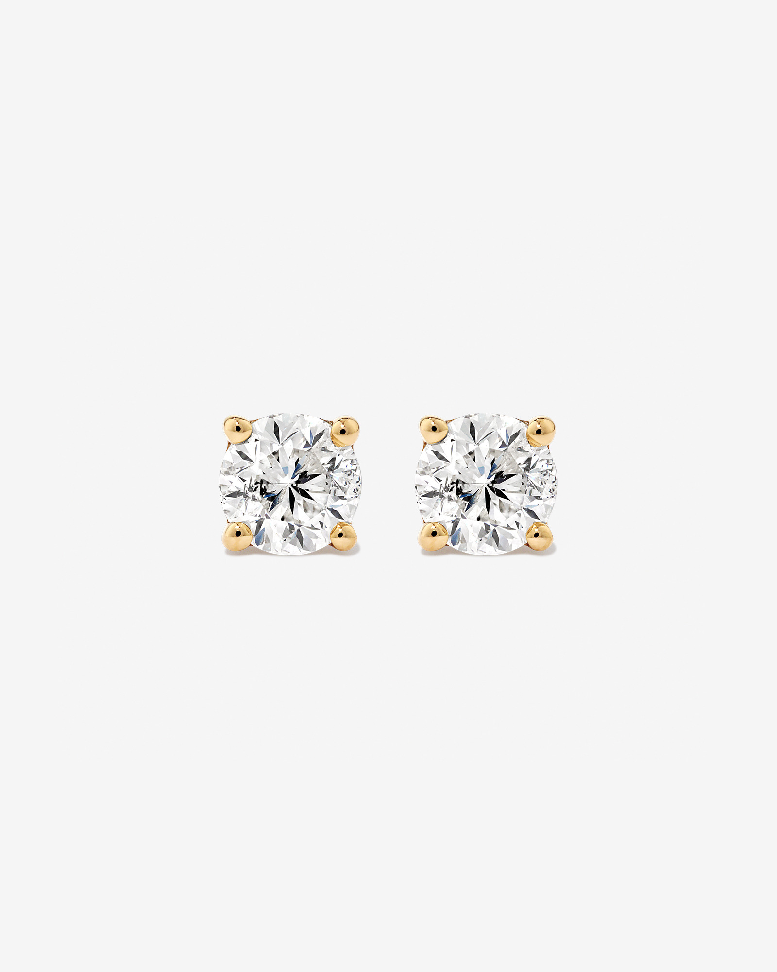 0,75 Carat TW Boucles d'oreilles puces solitaires en or jaune 18kt