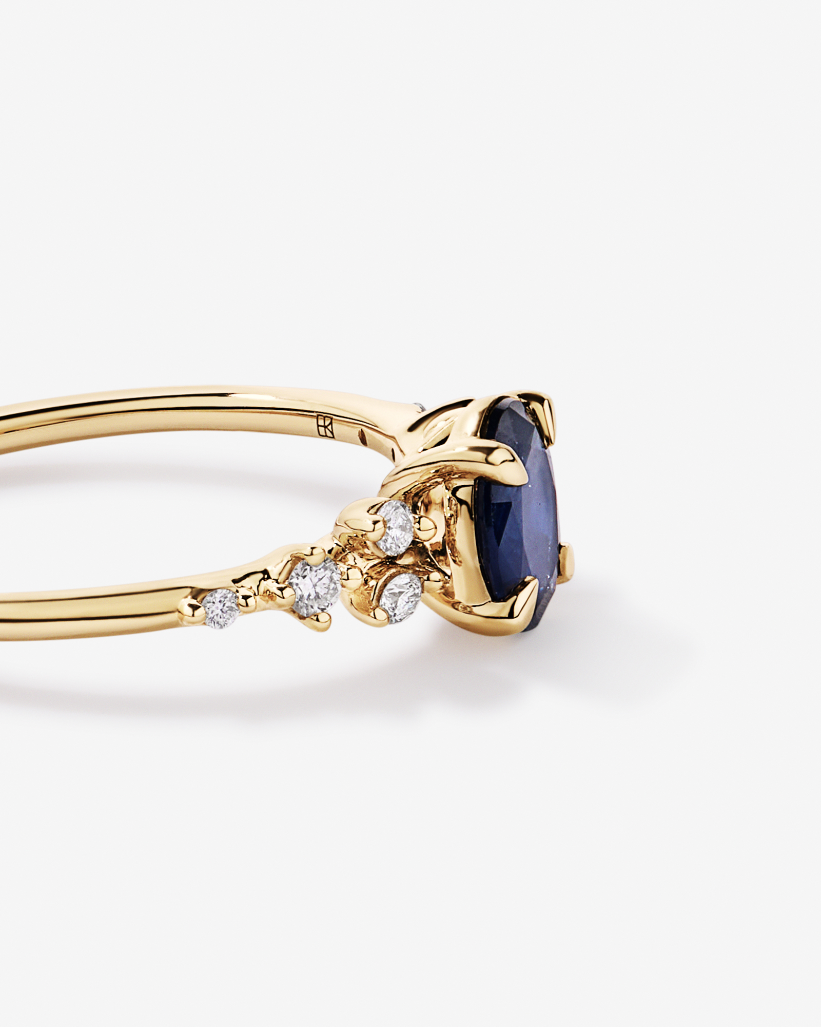 Sapphire and 0.12 Carat TW Diamond Ring 10kt Yellow Gold