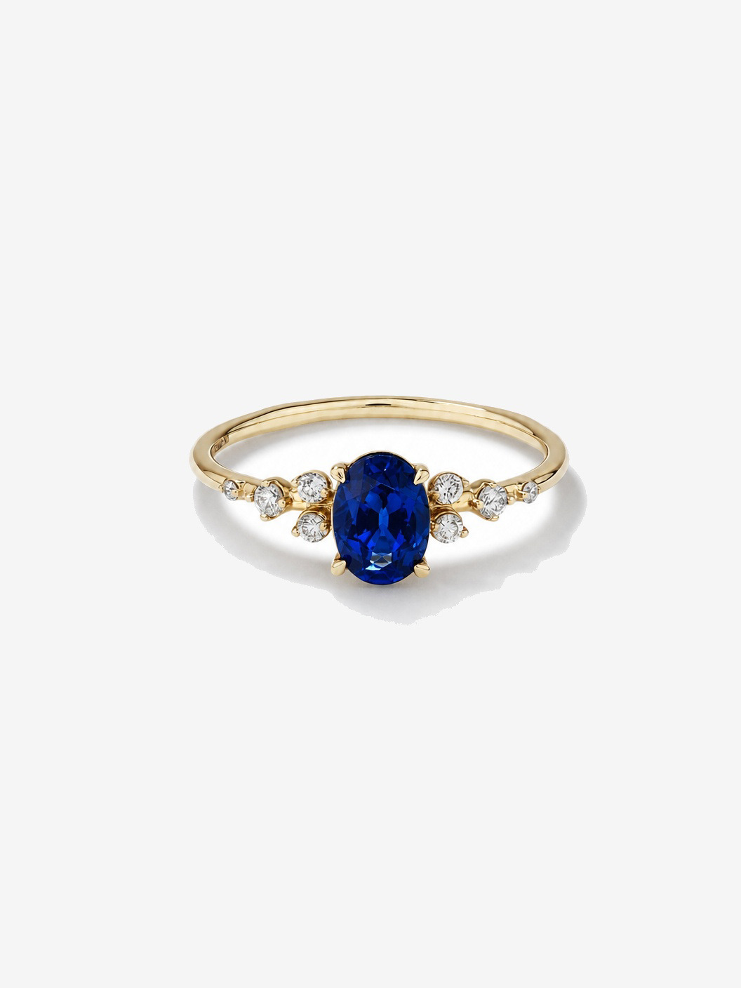 Sapphire and 0.12 Carat TW Diamond Ring 10kt Yellow Gold