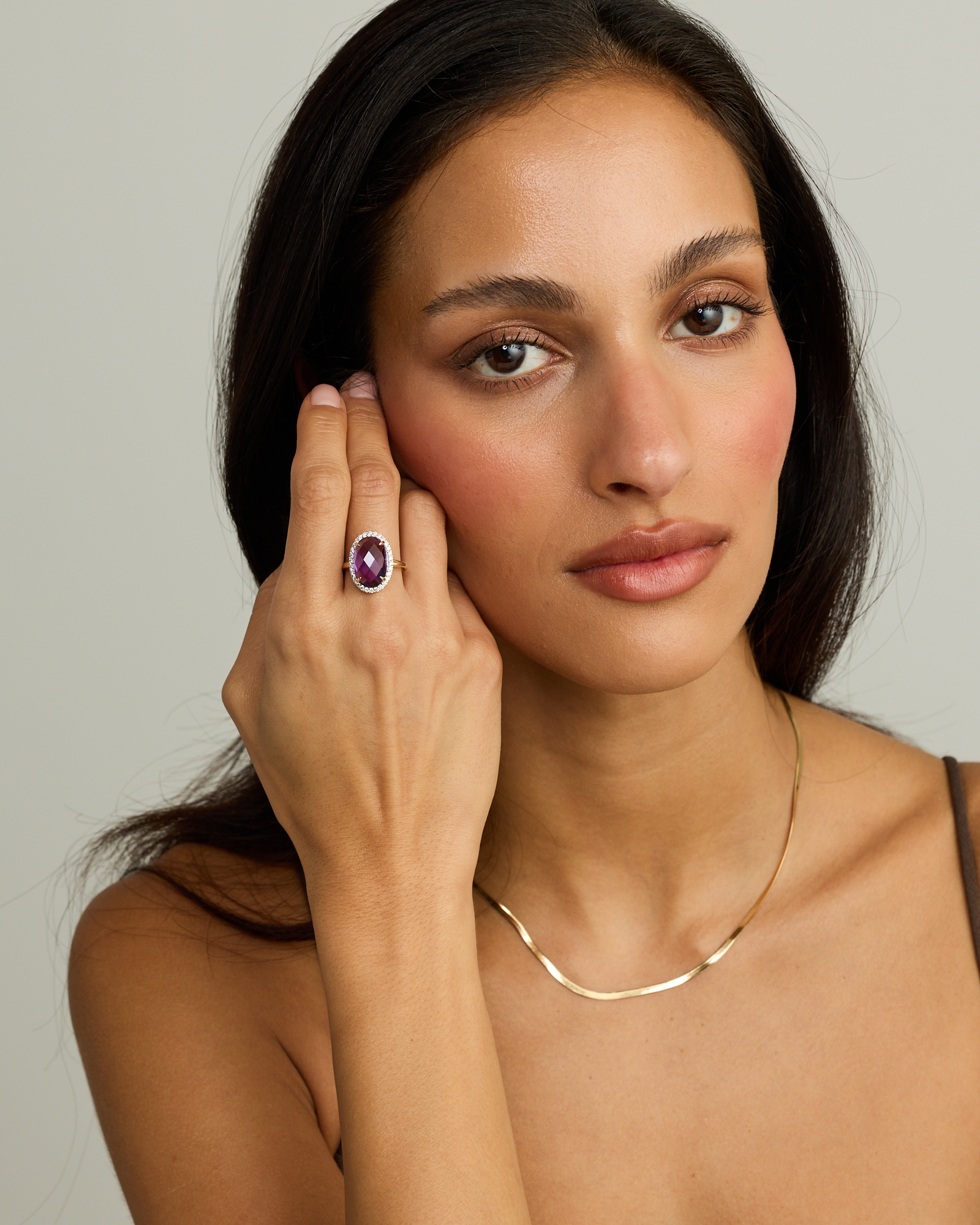 Oval Amethyst & 0.35 Carat TW Diamond Halo Ring 10kt Yellow Gold with Rhodium