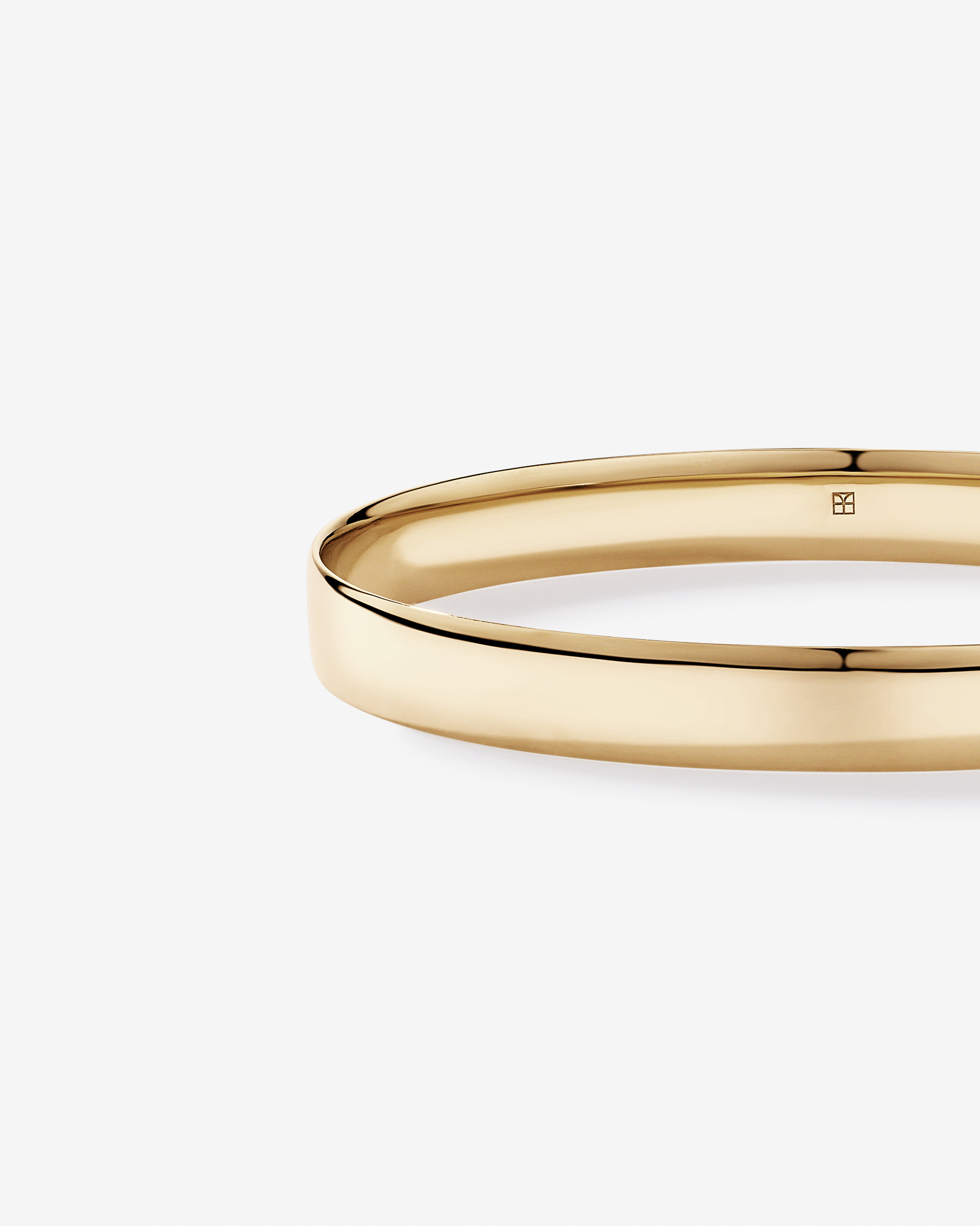 Wide Oval Bangle in 10kt Yellow Gold