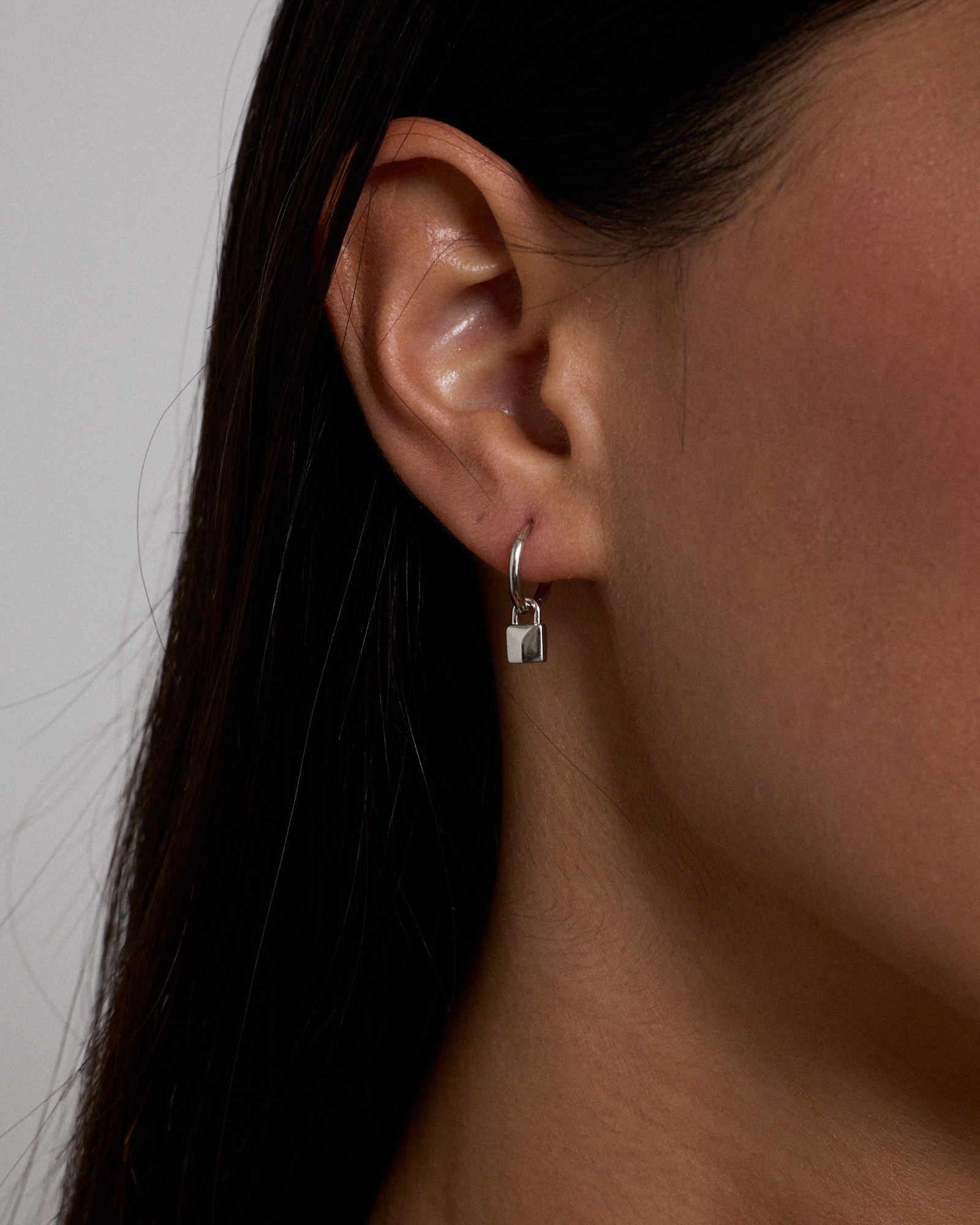 Signature Lock Hoop Huggie Earrings in Sterling Silver