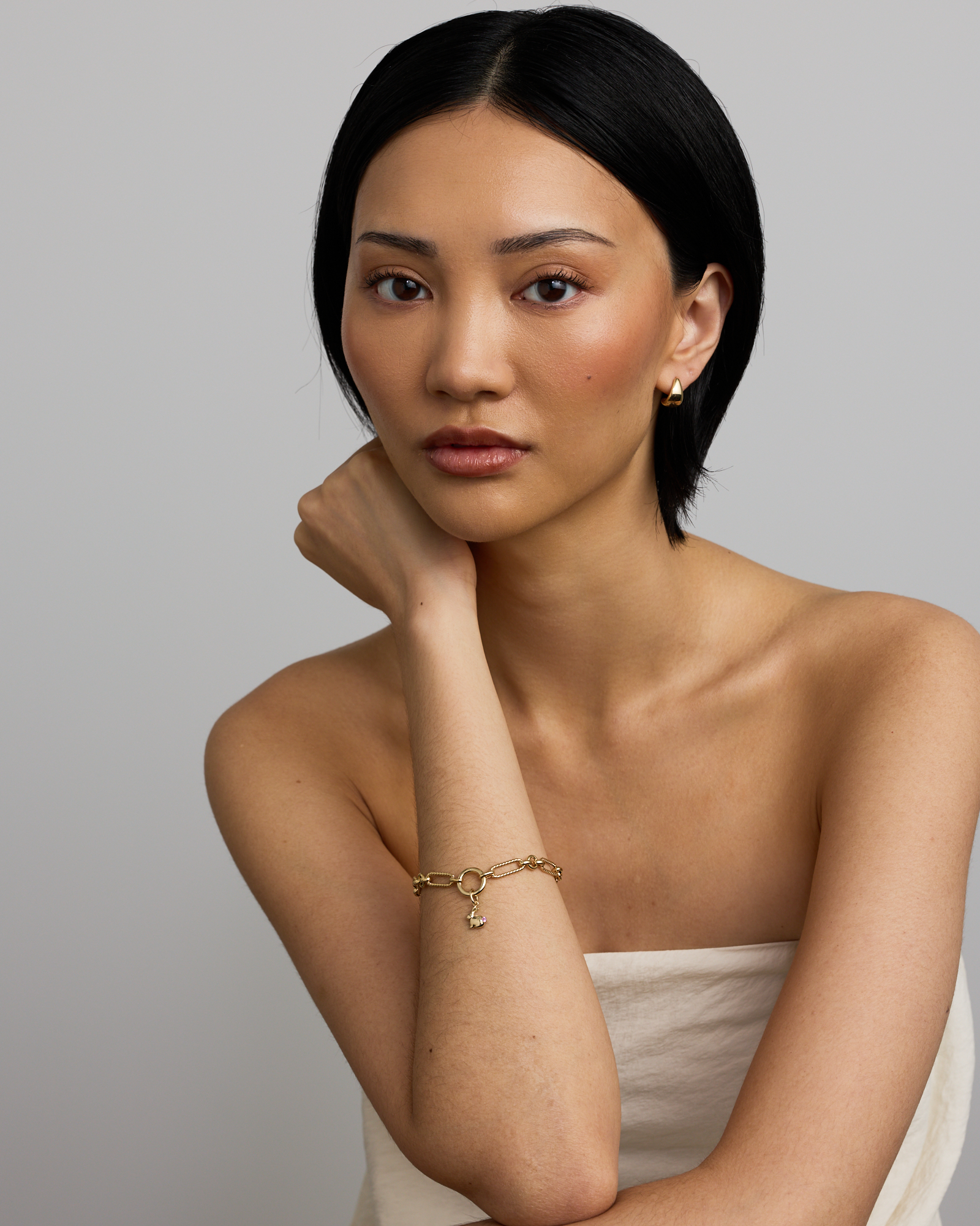 Bunny Pendant with Created Pink Sapphire in 10kt Yellow Gold