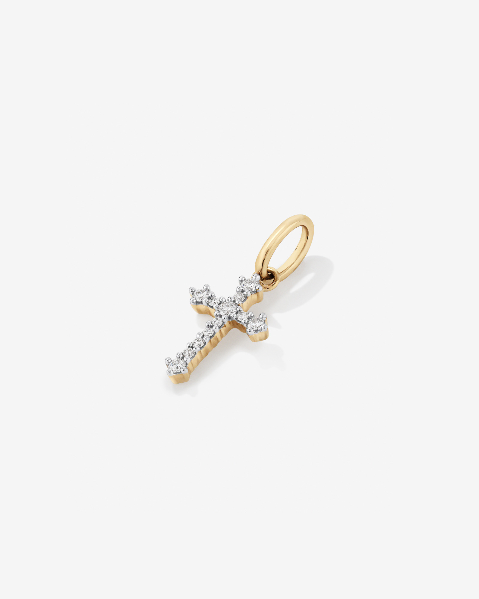 0.10 Carat TW Diamond Cross Pendant in 10kt Yellow Gold