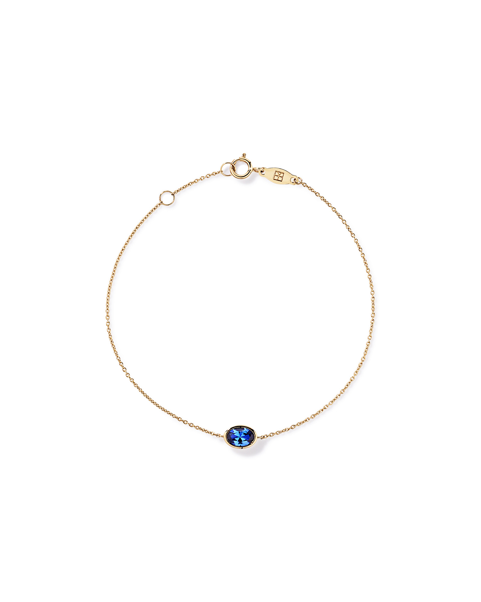A créé un bracelet saphir bleu en or jaune 10 carats