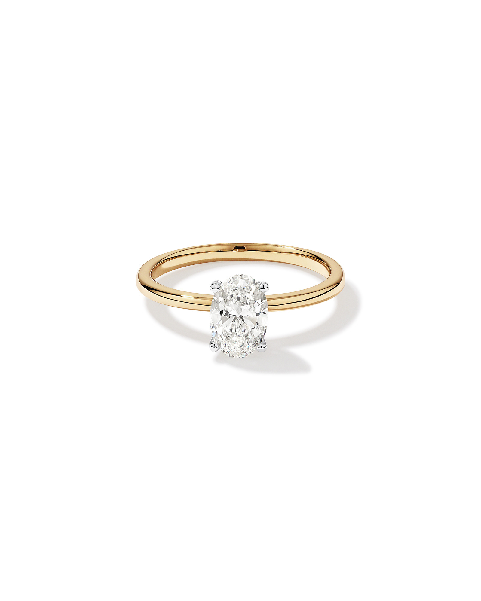 Bague solitaire en diamant canadien ovale 1,00 carat poids total en or jaune et blanc 18 kt