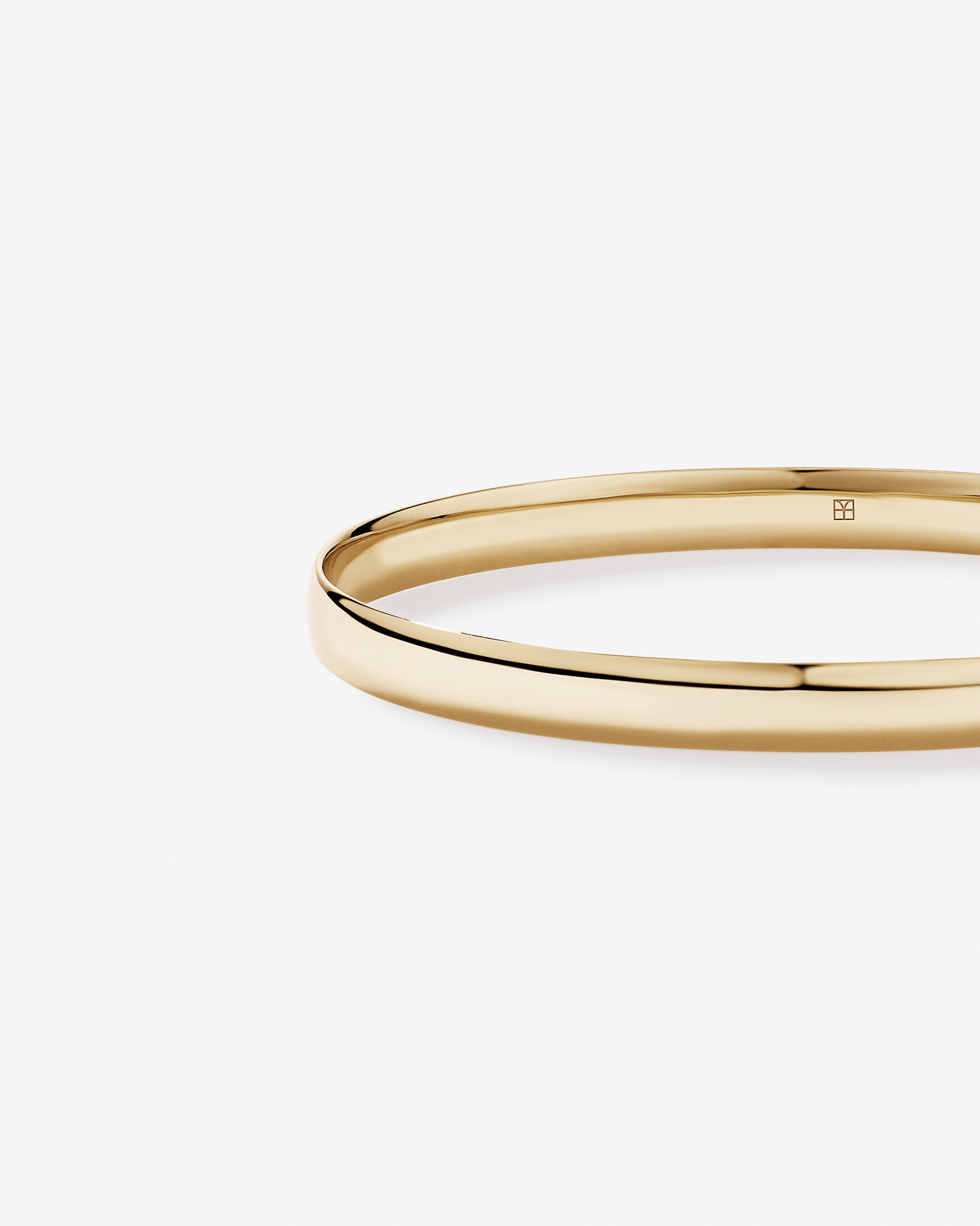 Bold Oval Bangle in 10kt Yellow Gold