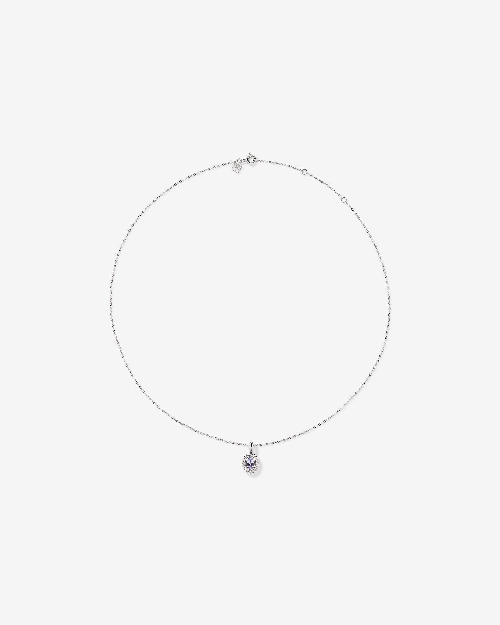 Tanzanite & 0.15TW of Diamond Halo Pendant with Chain in 10kt Gold