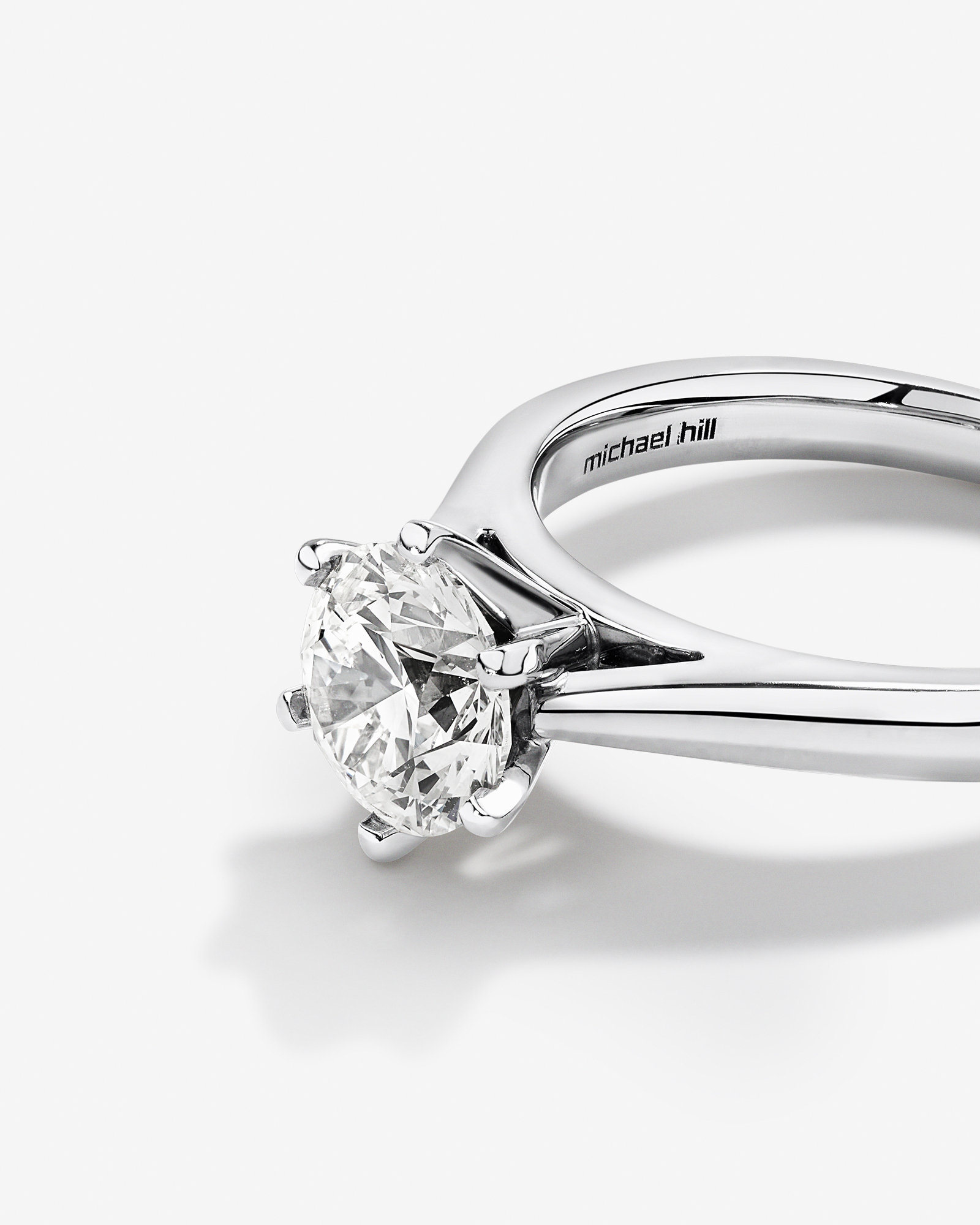 Certified Solitaire Engagement Ring with a Carat TW Diamond in 14kt White Gold