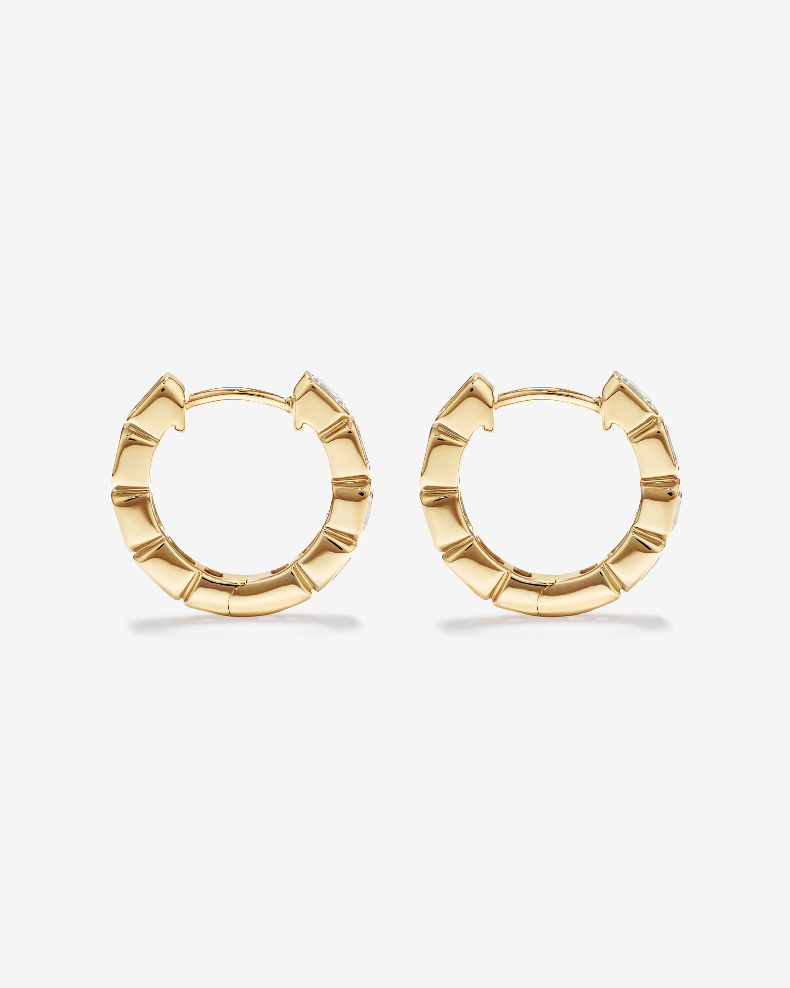 0.40 Carat TW of Laboratory-Grown Emerald Cut Diamond Huggie Earrings in 10kt Yellow Gold