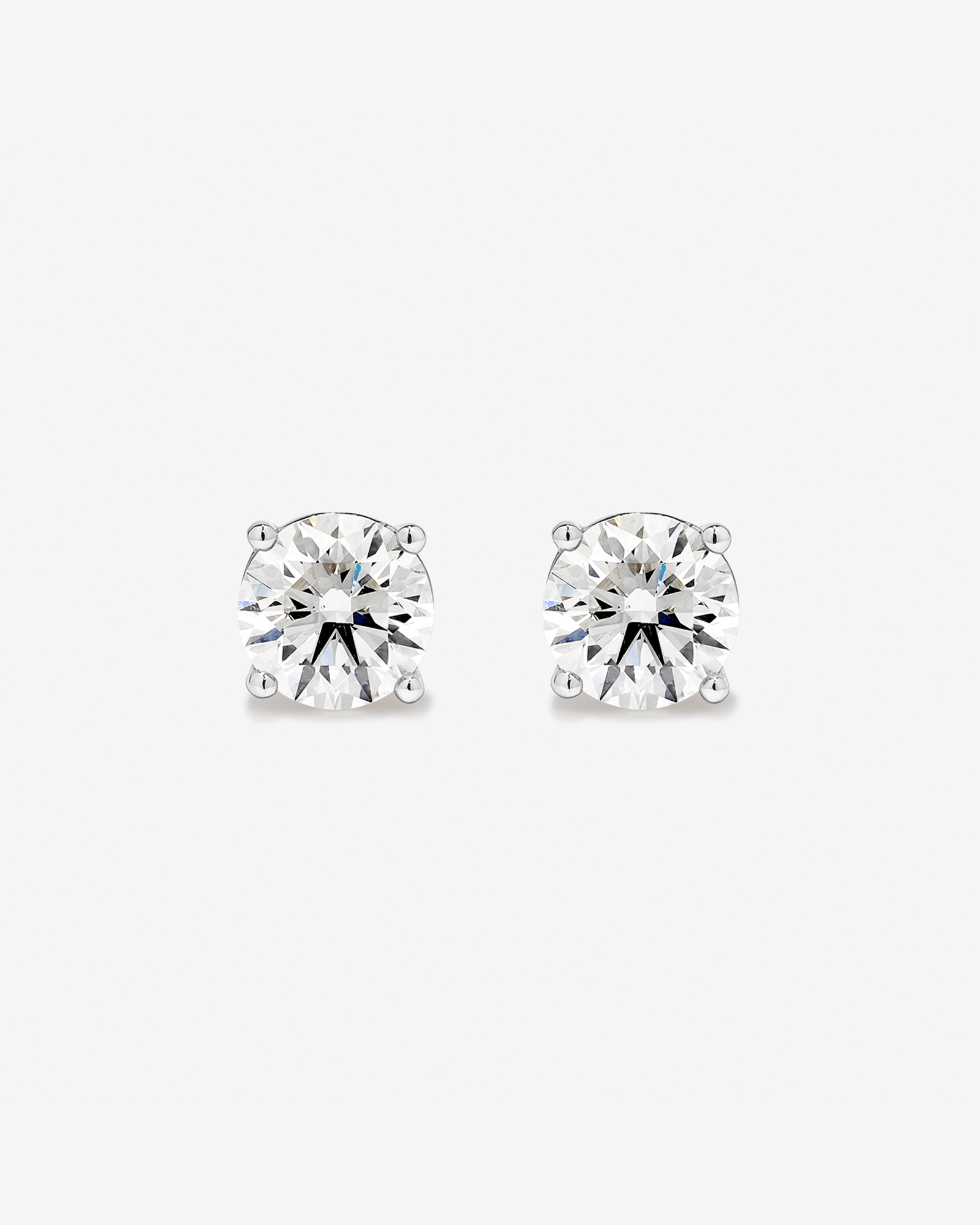 1.00 Carat TW Canadian Diamond Solitaire Stud Earrings in 18kt White Gold