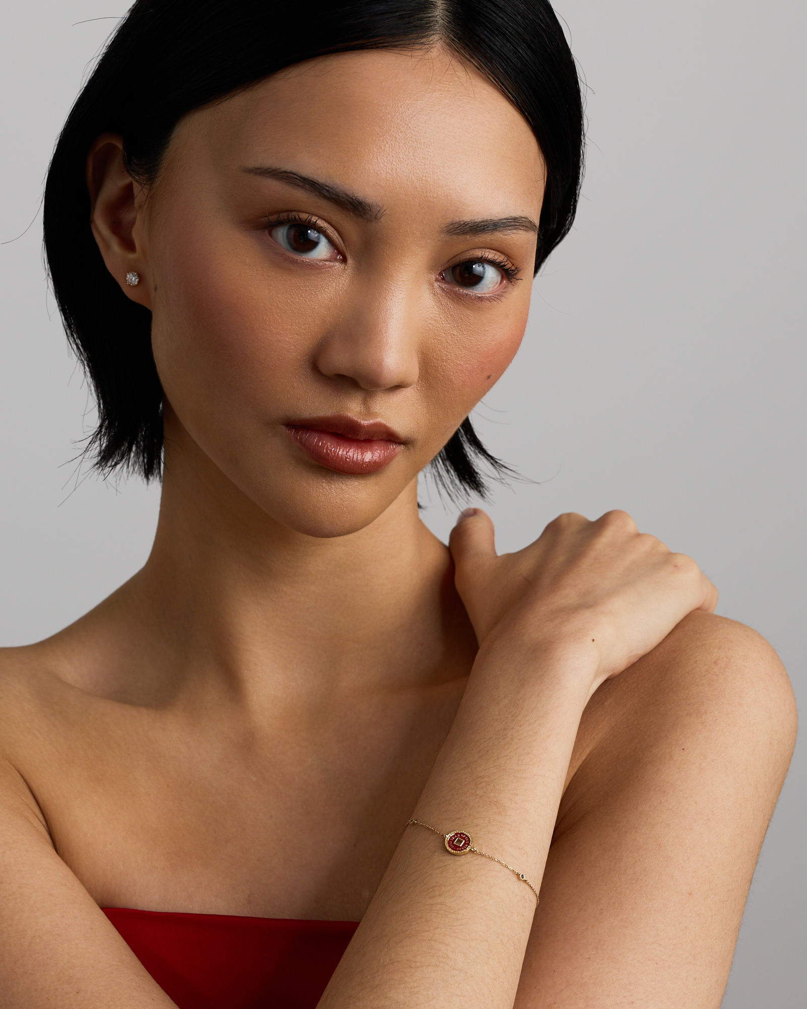 Horse Coin Bracelet with Garnets in 10kt Yellow Gold