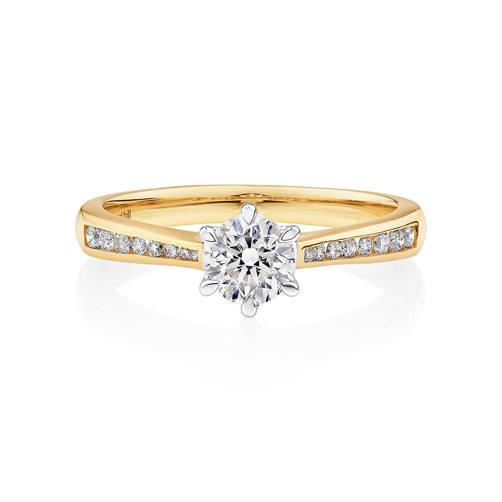 Bague en or blanc et jaune 14 K à diamants totalisant 0,73 ct