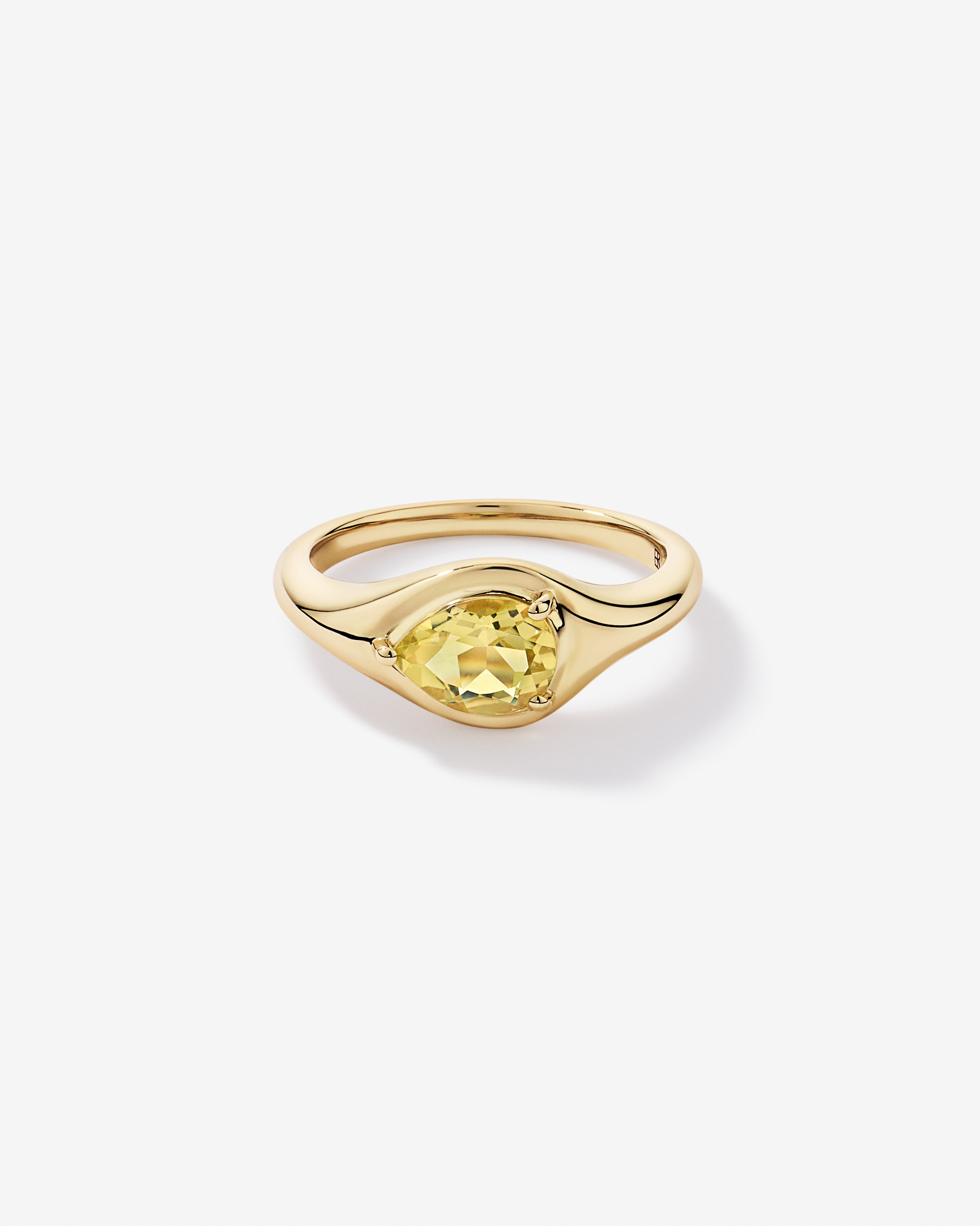 Anneau serti en quartz citron taillé poire d’est ouest or jaune 10 carats