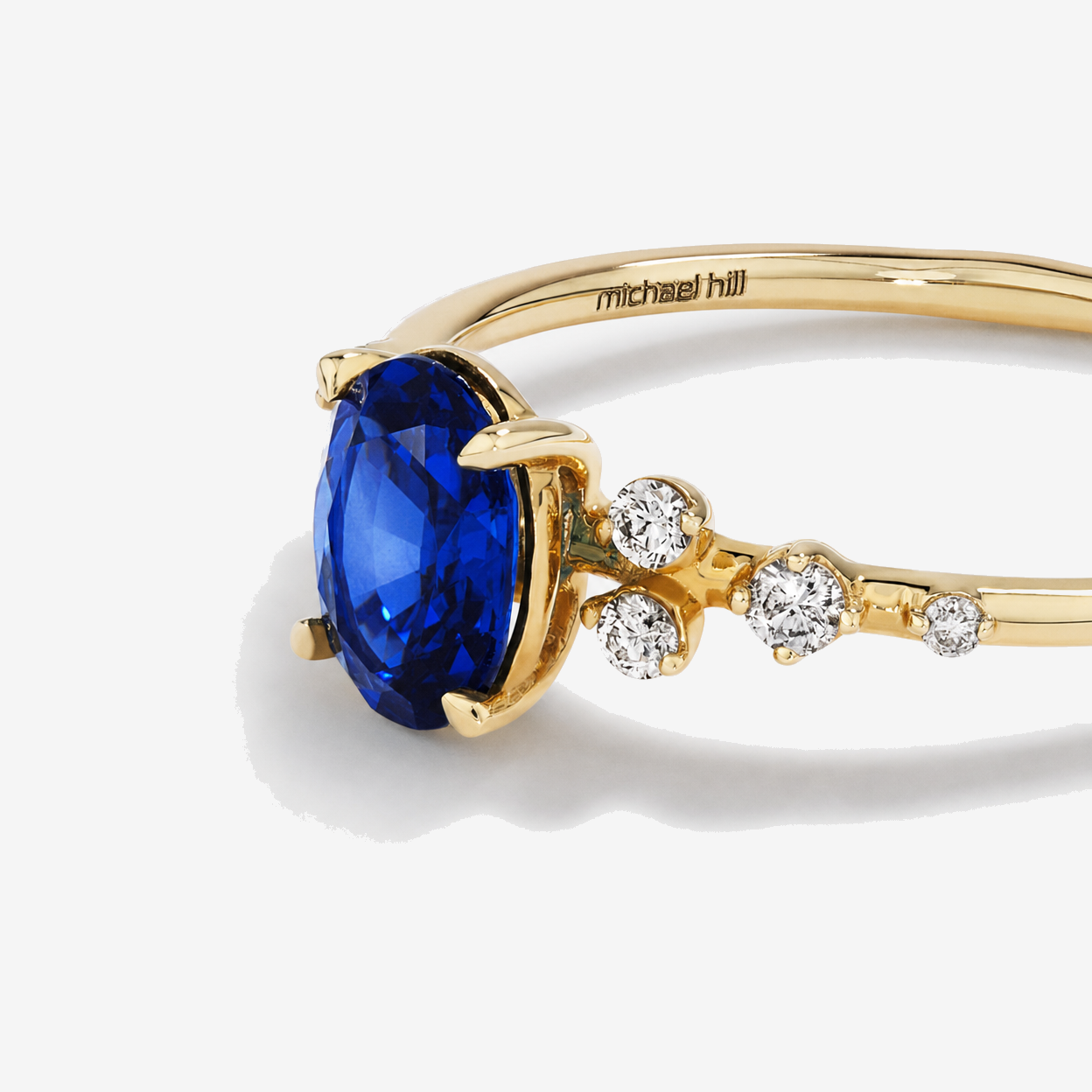Sapphire and 0.12 Carat TW Diamond Ring 10kt Yellow Gold