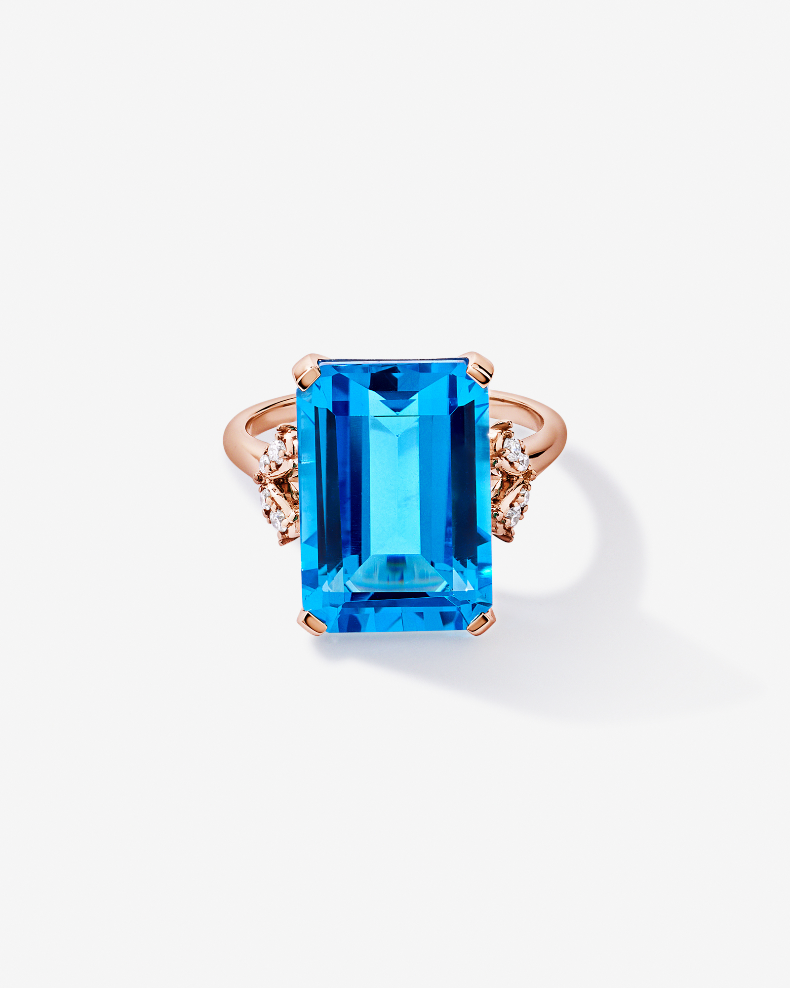 Emerald Cut Swiss Blue Topaz & 0.08 Carat TW Diamond Ring 10kt Rose Gold