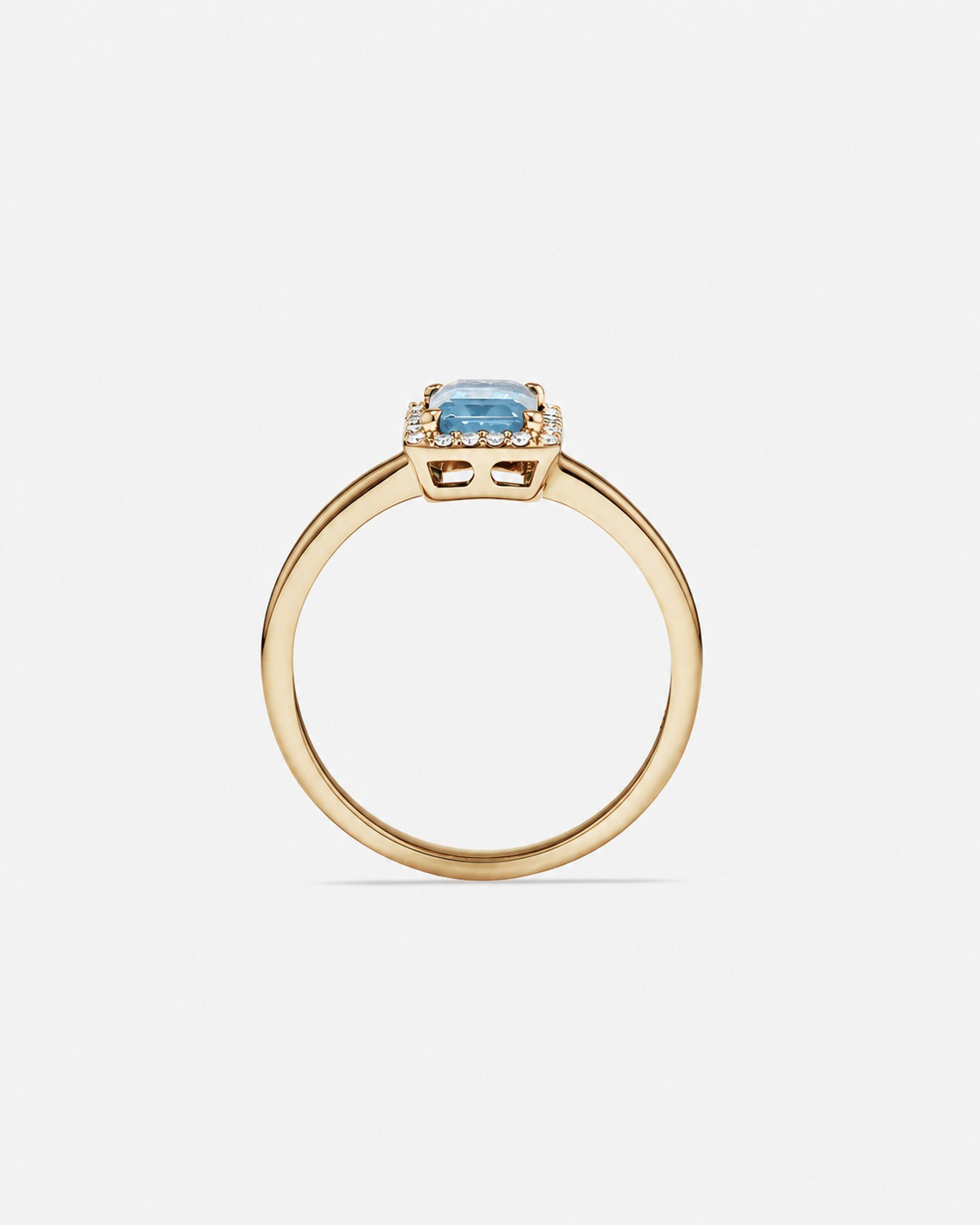 Bague halo Topaze bleue taille émeraude avec diamants en or jaune 10 ct