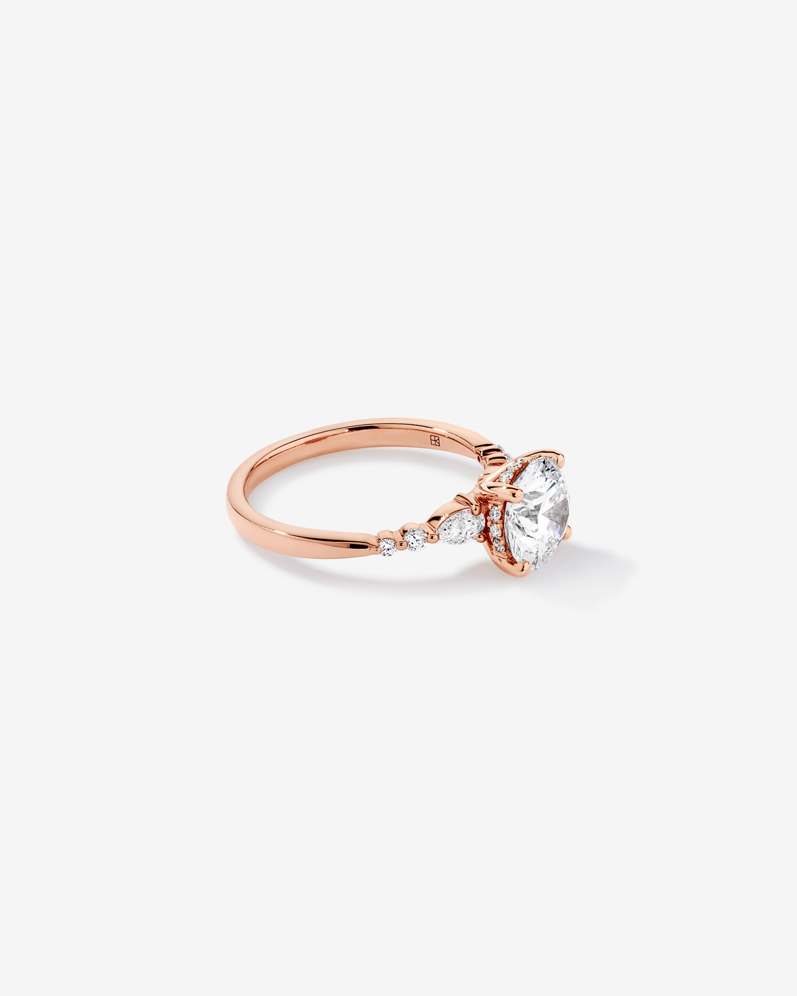 2.28 Carat TW Round Brilliant and Pear Laboratory-Grown Diamond Side Accent Ring 14kt Rose Gold