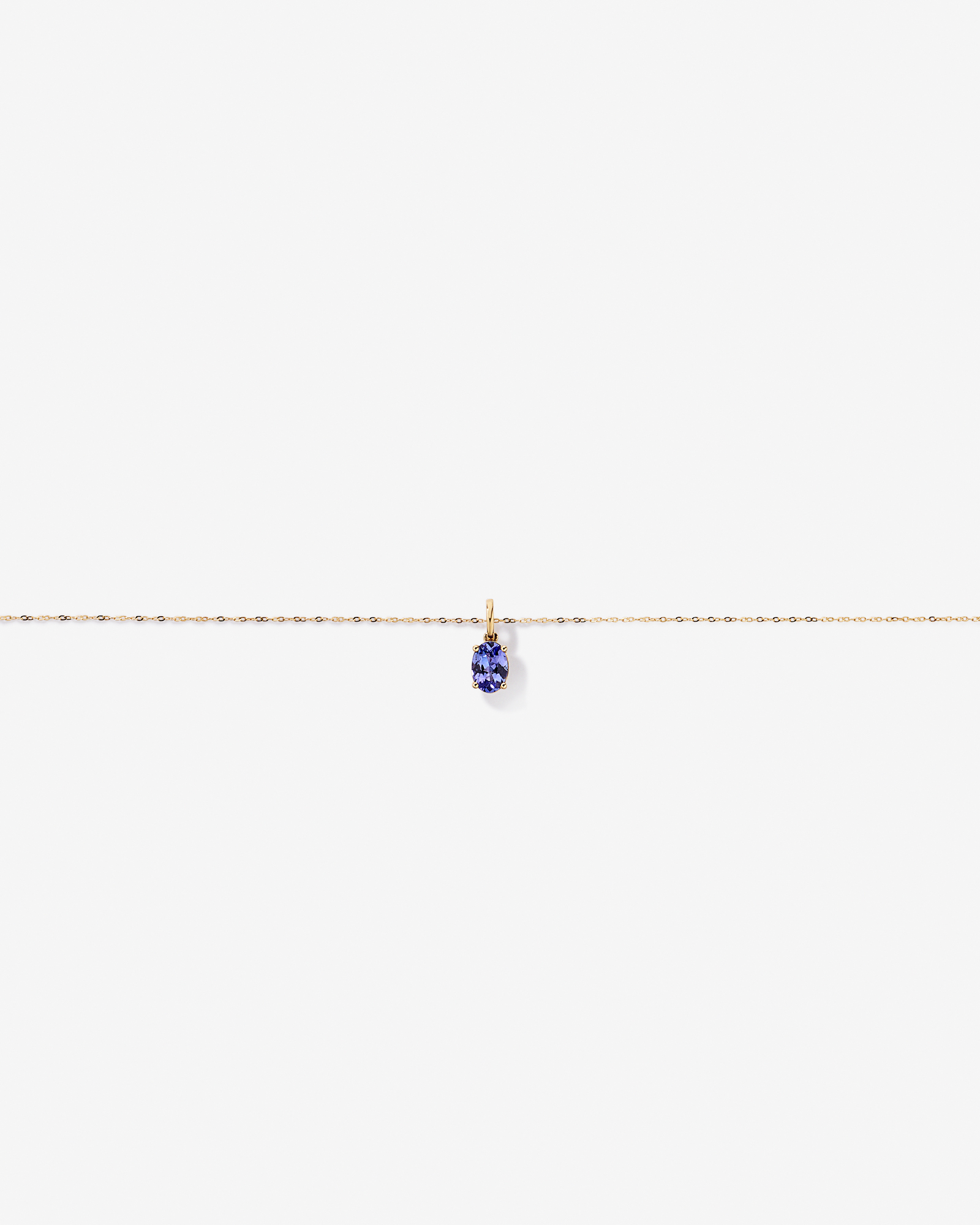 Tanzanite Solitaire Pendant With Chain in 10kt Yellow Gold