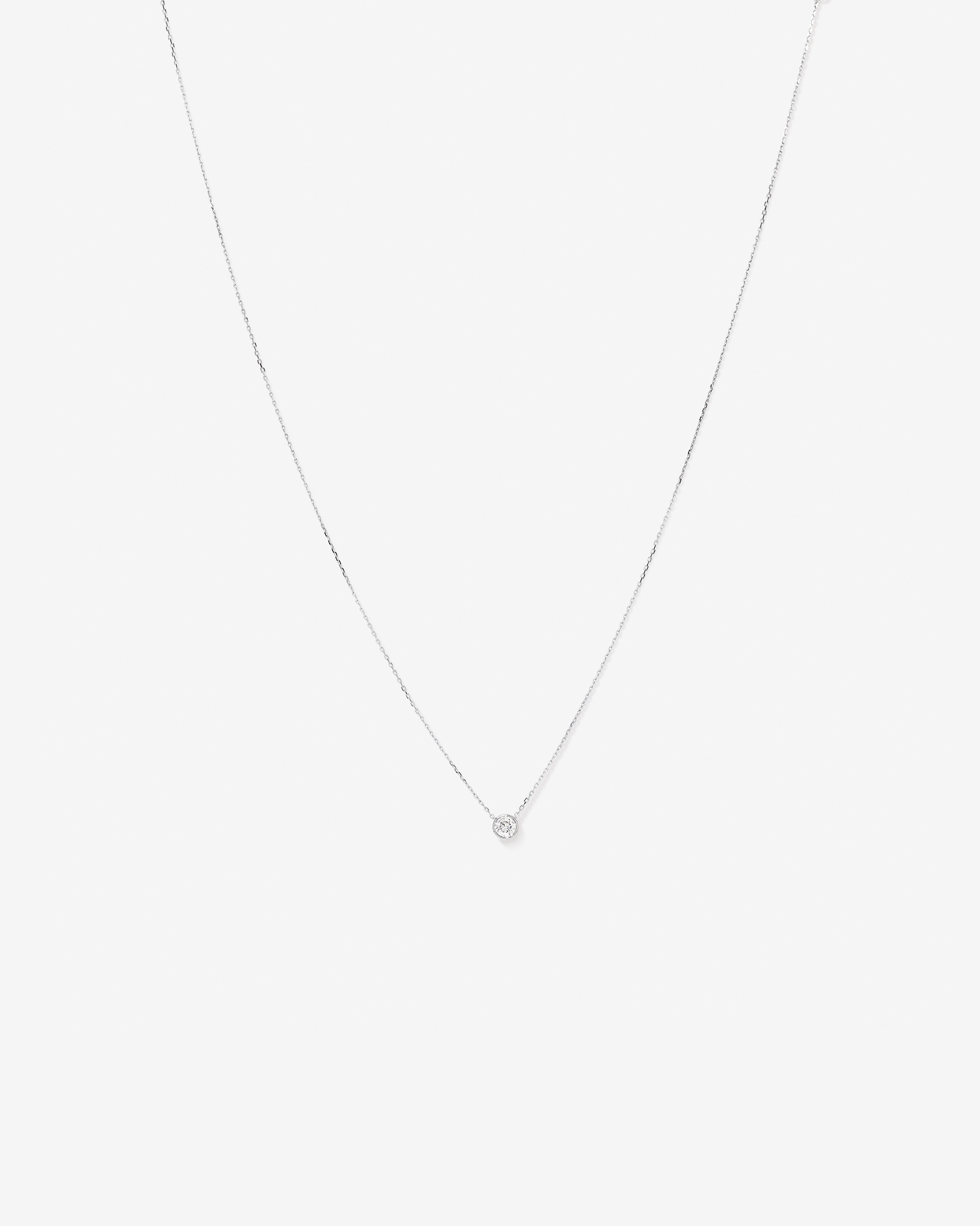 0.25 Carat TW Round Brilliant Diamond Bezel Set Pendant in 18kt White Gold