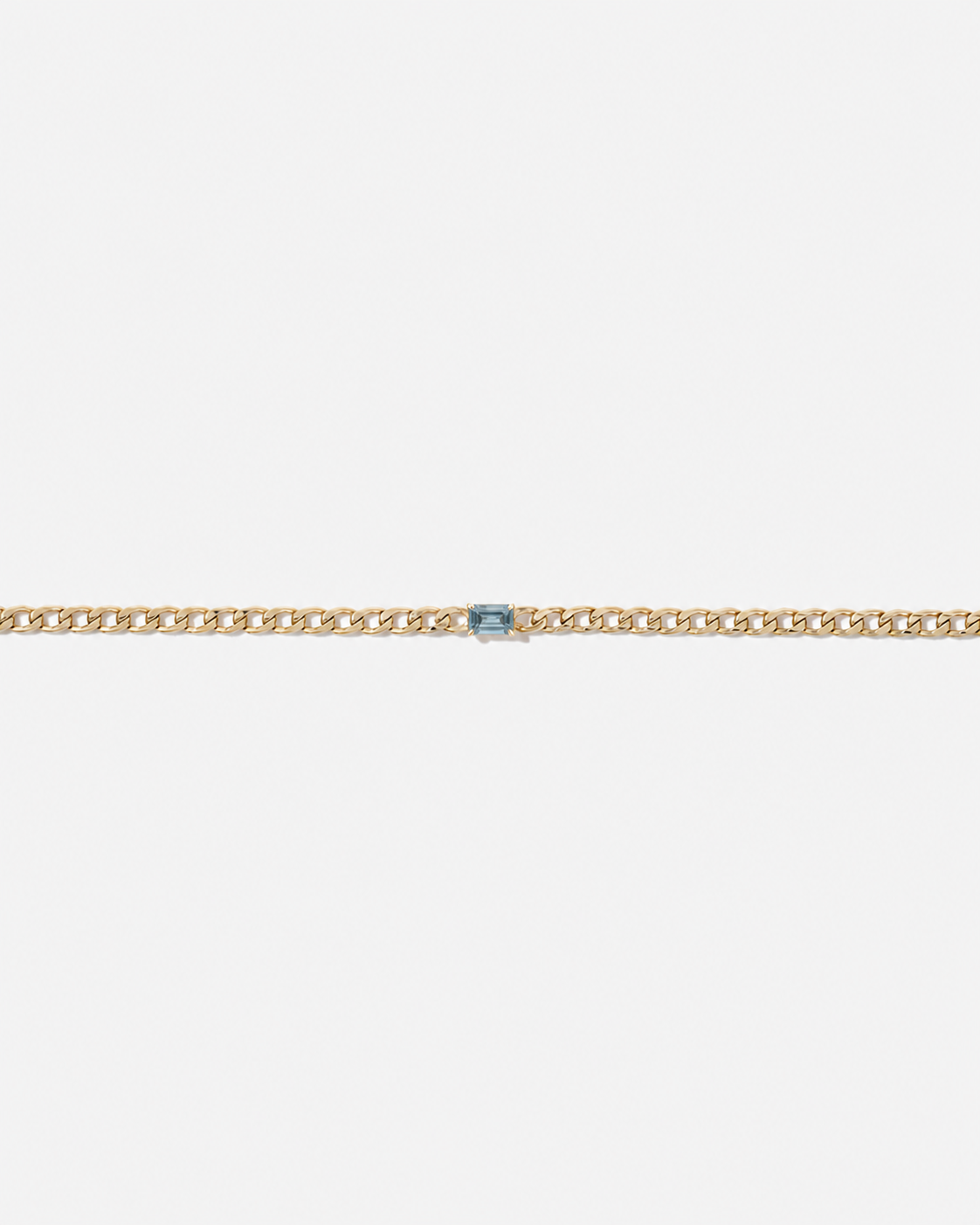 Blue Topaz Curb Link Bracelet in 10kt Yellow Gold