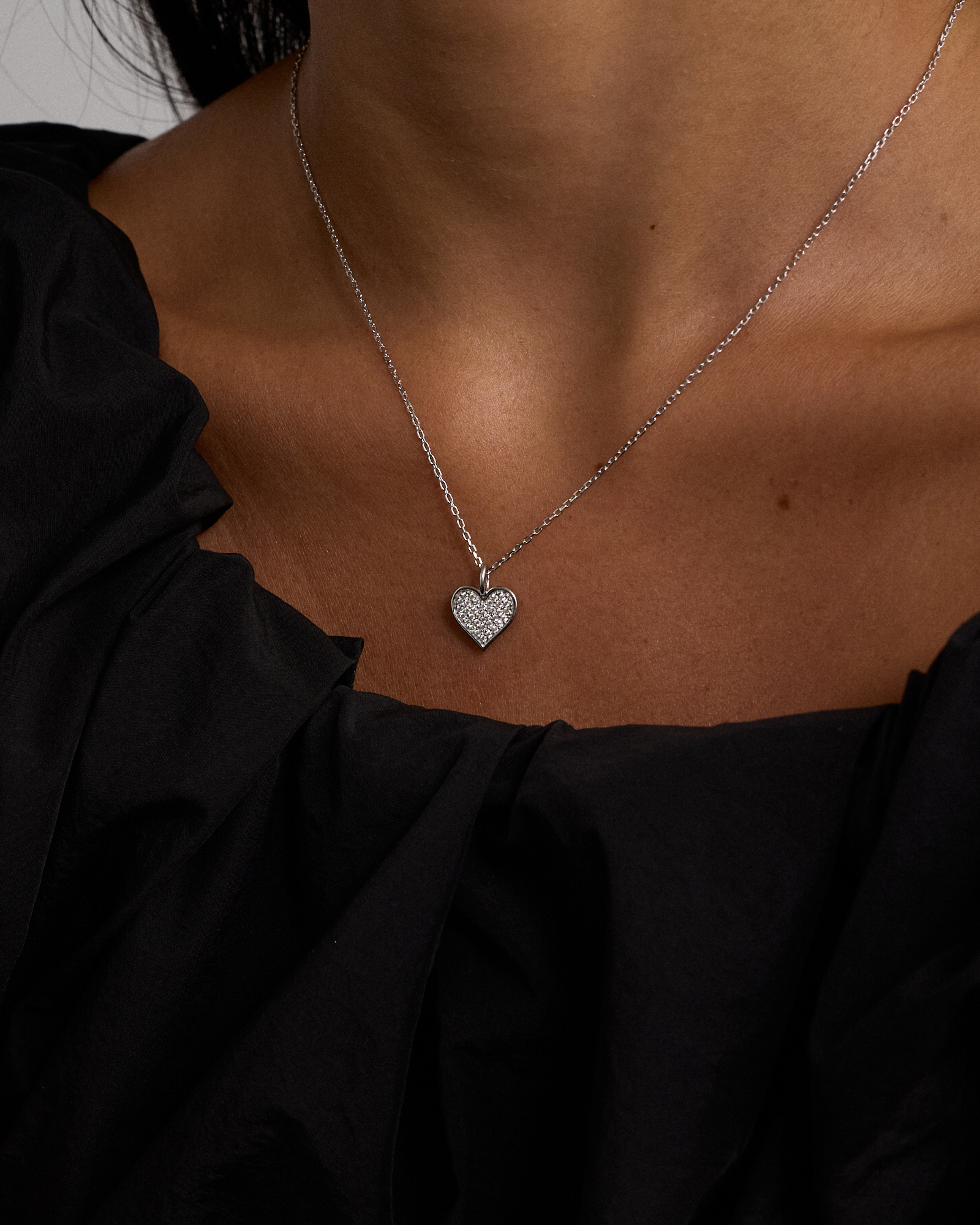 Cubic Zirconia Closed Heart Pendant Necklace in Sterling Silver