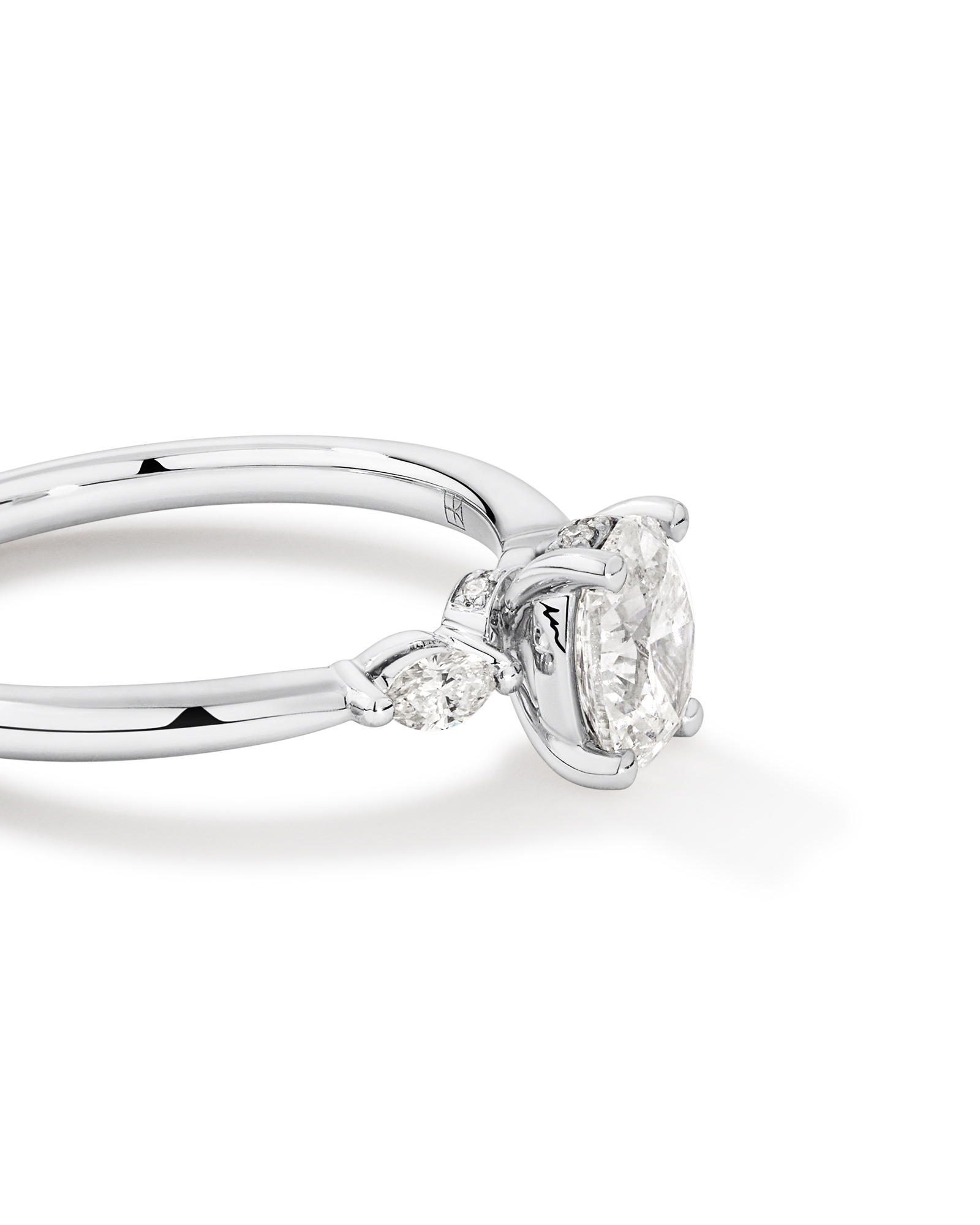 0.77 Carat TW Three Stone Oval and Marquise Cut Hidden Halo Engagement Ring in Platinum