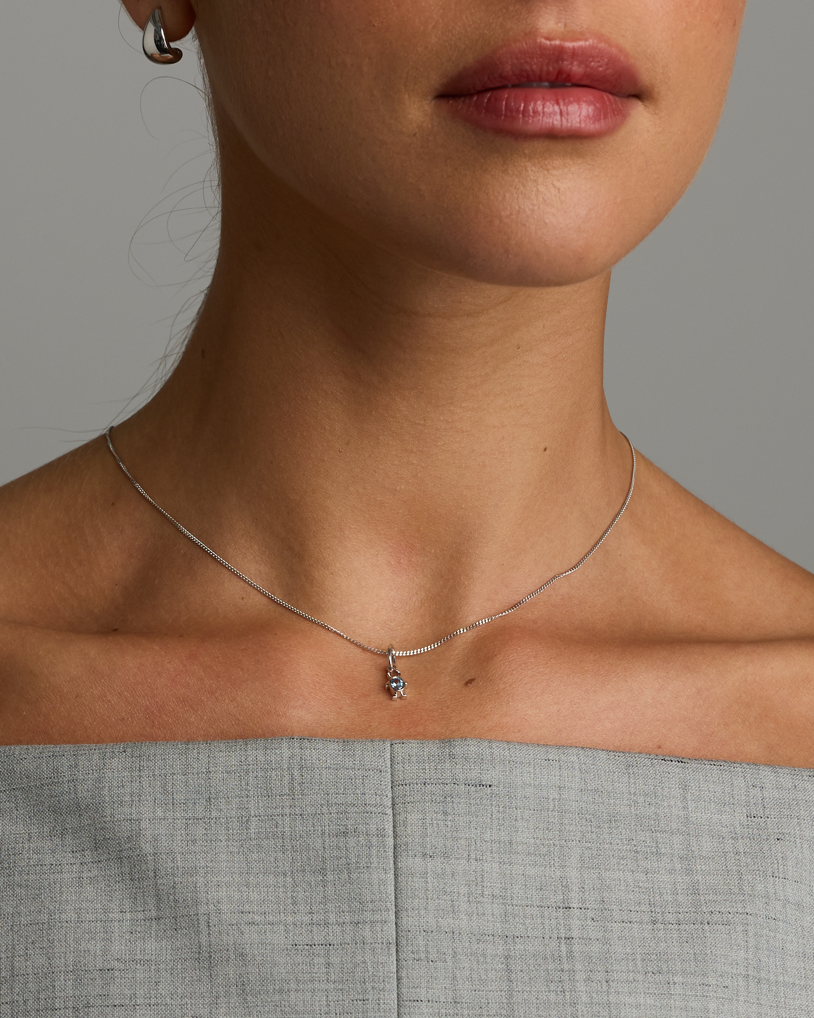 Blue Topaz Boy Pendant in Sterling Silver