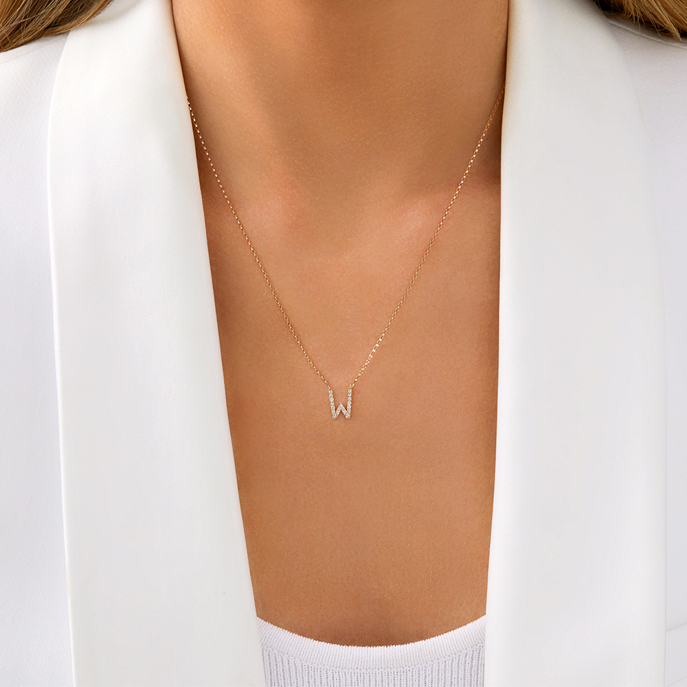 Collier à initiale « W » en or jaune 10 K à diamants totalisant 0,10 ct