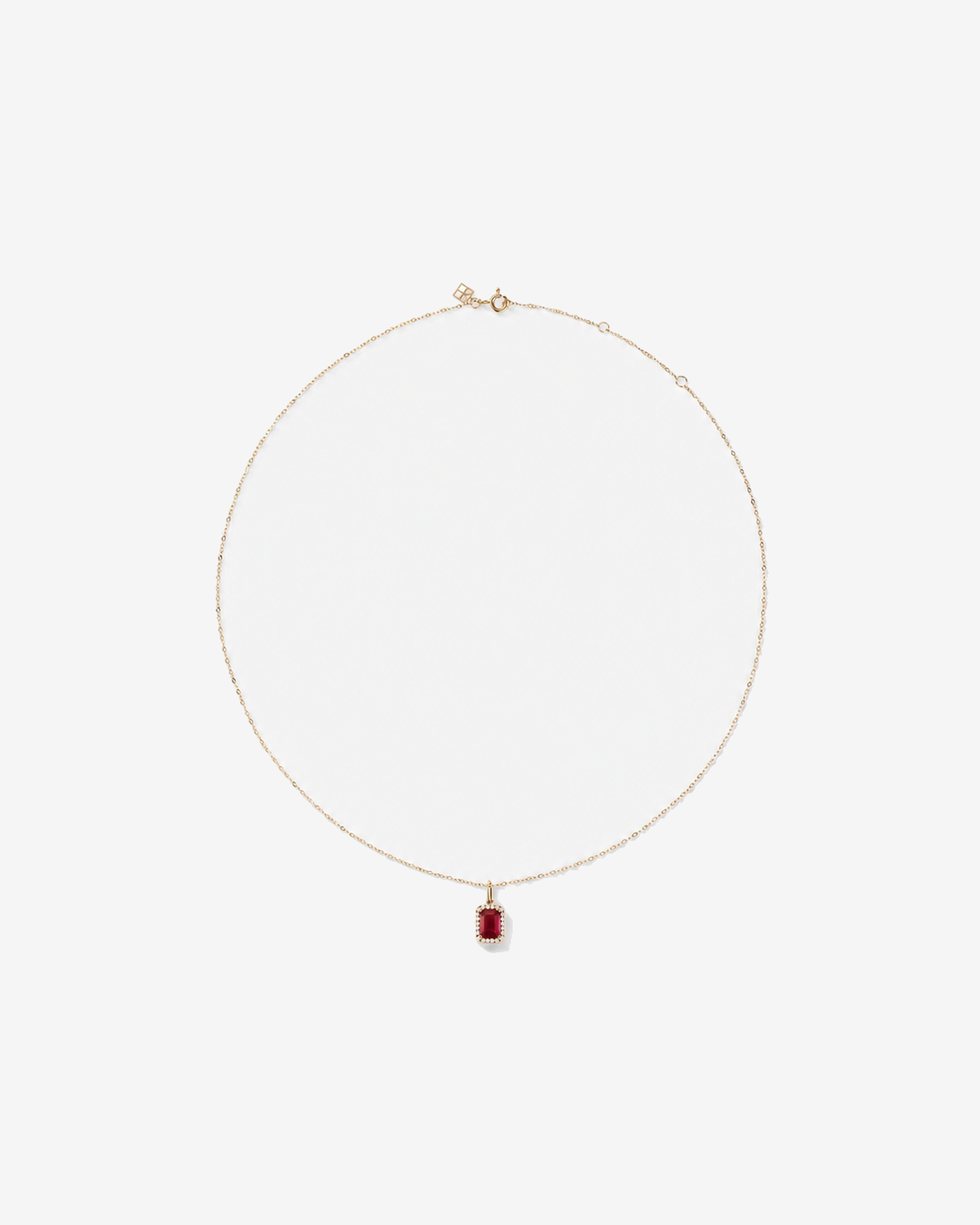 Emerald Cut Created Ruby and Diamond Halo Pendant with Chain in 10kt Yellow Gold
