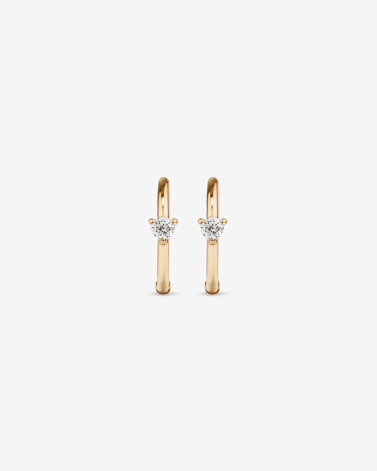 Boucles d'oreilles dormeuses accentuées de diamants en or jaune 10kt