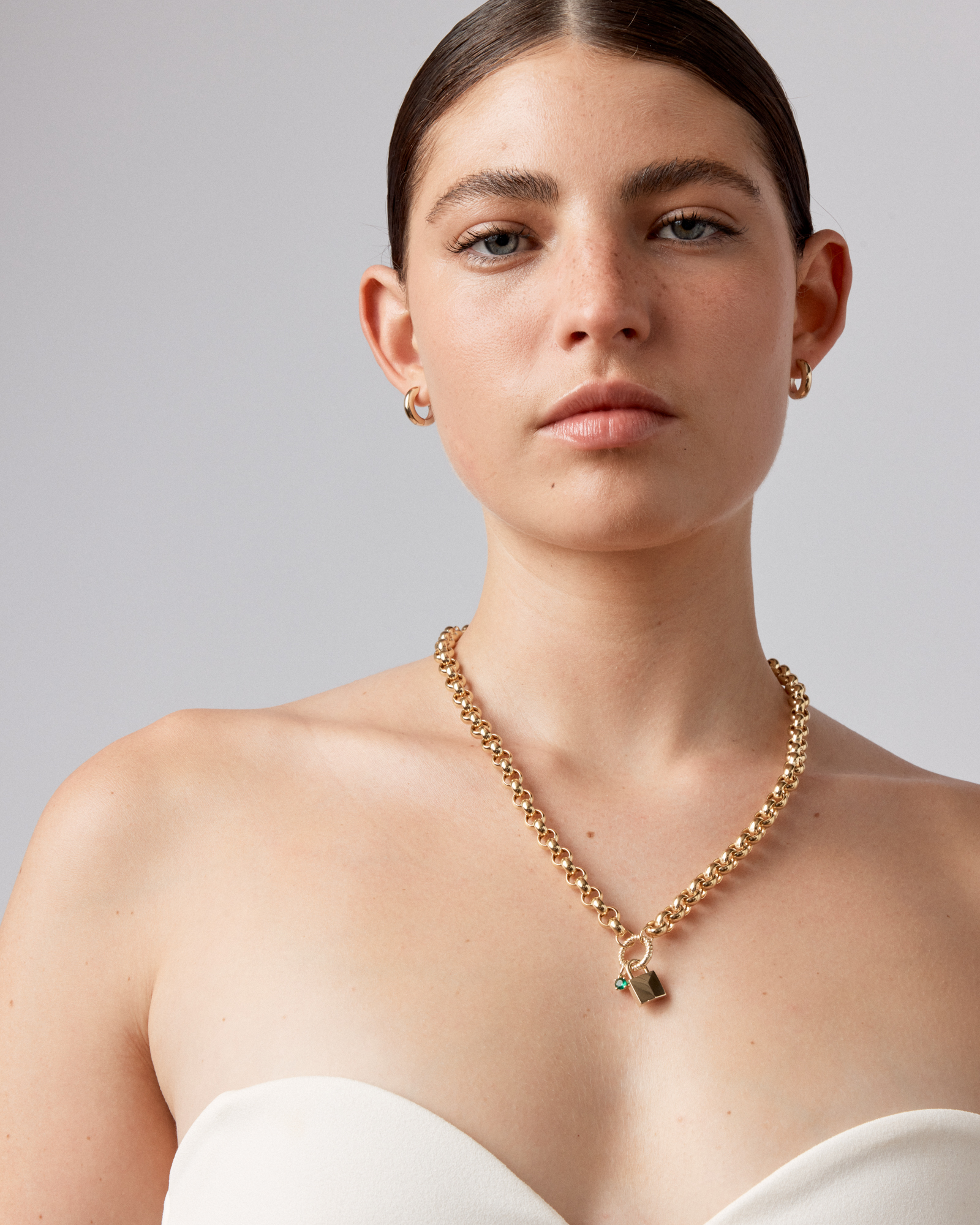 Pendentif cadenas signature en or jaune 10 carats