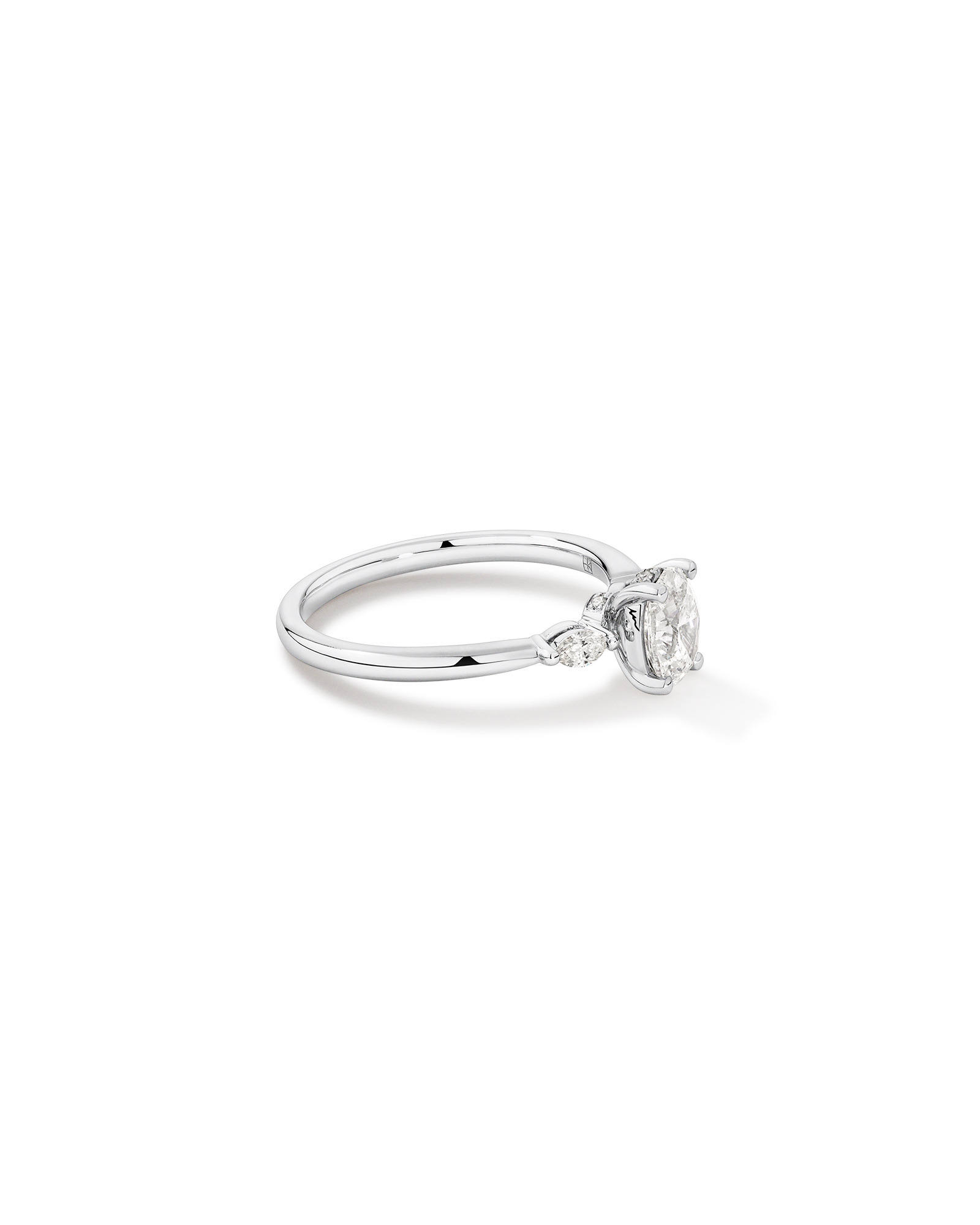 0.77 Carat TW Three Stone Oval and Marquise Cut Hidden Halo Engagement Ring in Platinum