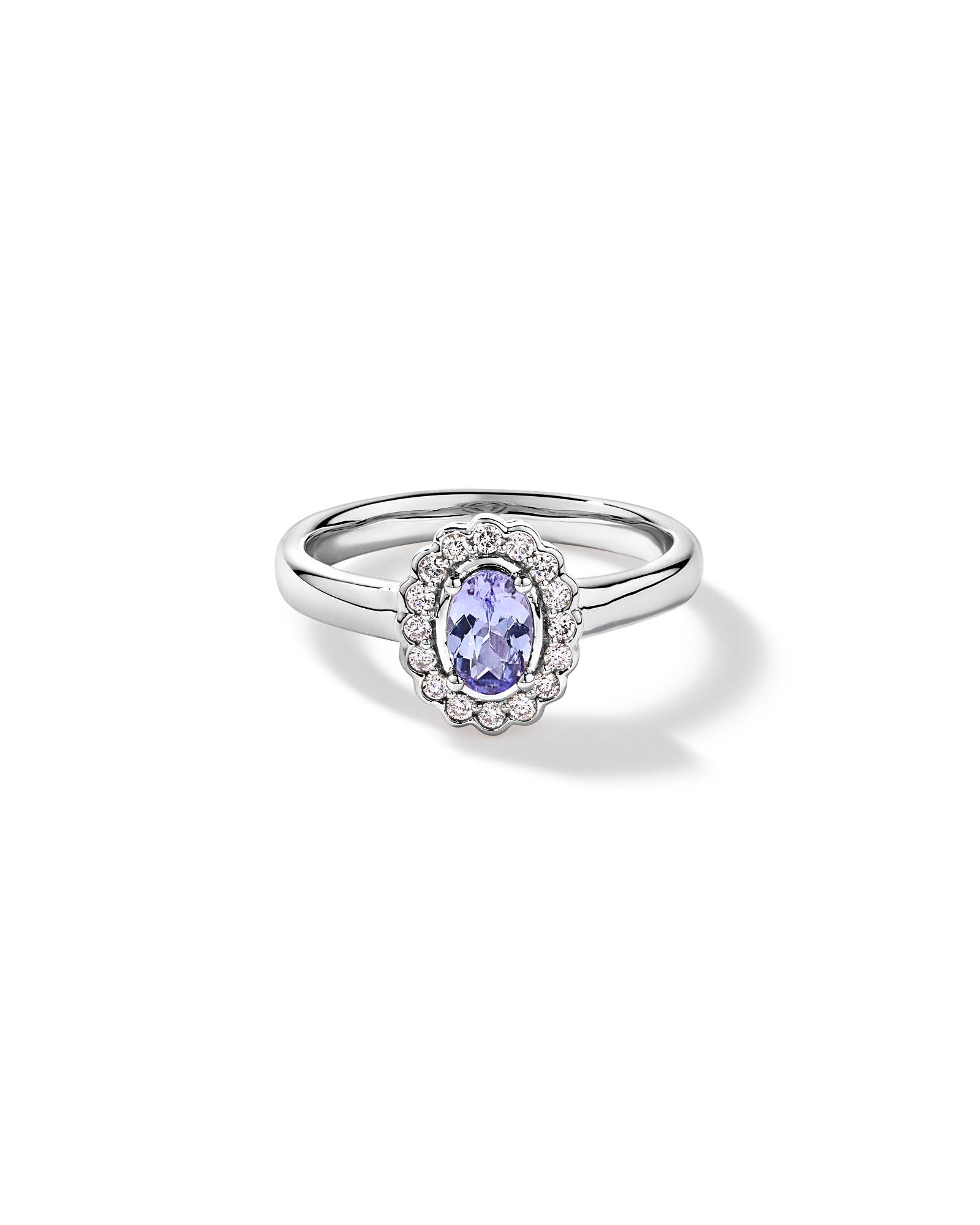 Tanzanite & 0.15TW of Diamond Halo Ring 10kt White Gold