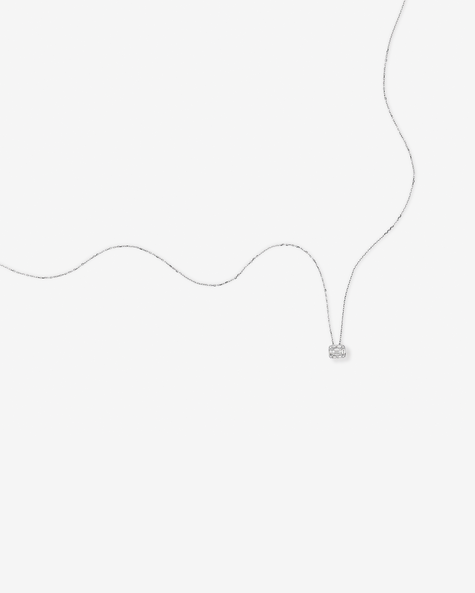 0.28 Carat TW Multistone Emerald Cut Diamond Pendant in 10kt White Gold