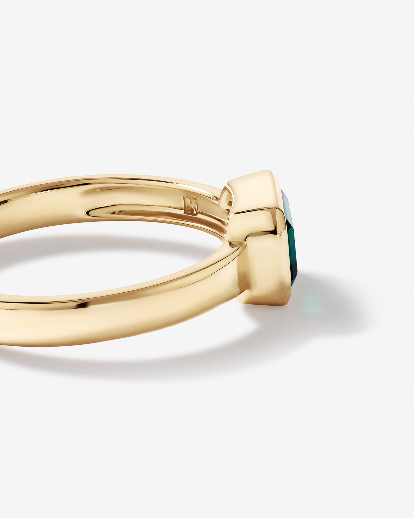 East-West Set Created Emerald Bezel Ring in 10kt Yellow Gold