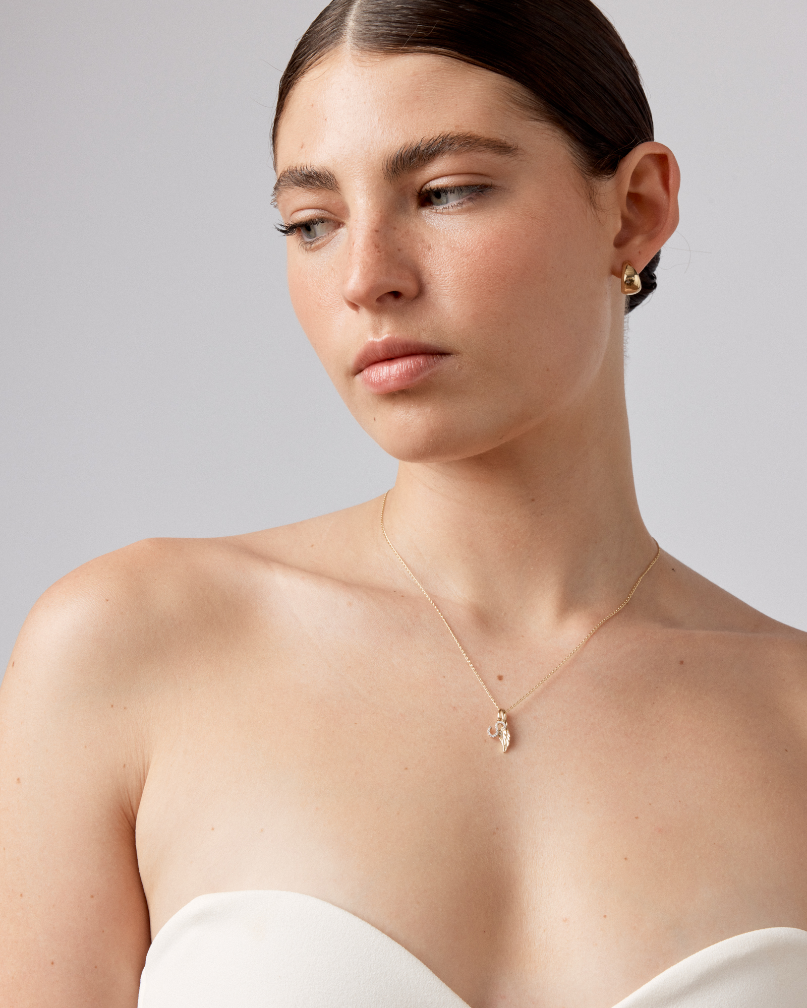 Pendentif aile d'ange avec accent diamant en or jaune 10 carats