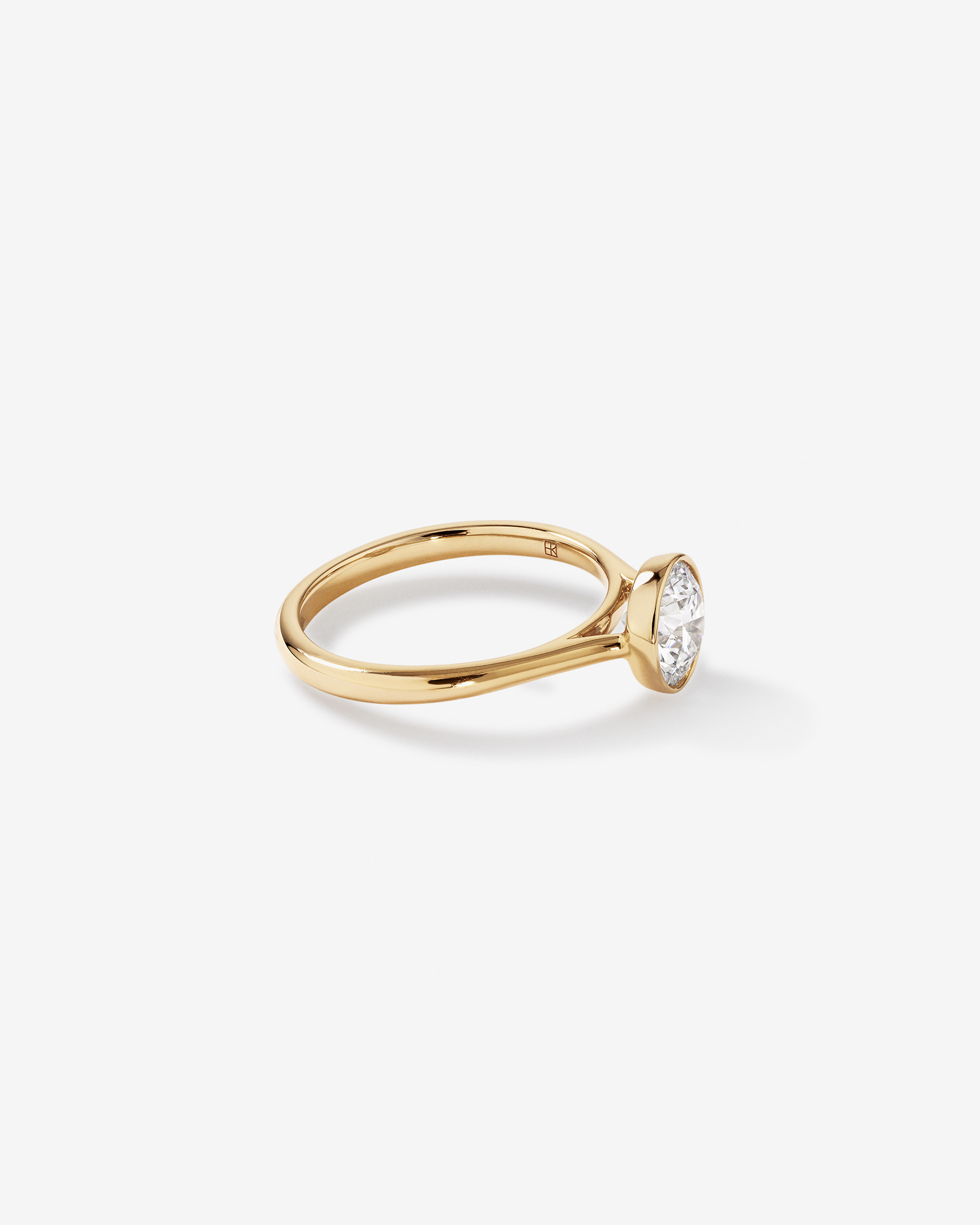 1.25 Carat TW Round Brilliant Laboratory-Grown Diamond Solitaire Bezel Set Engagement Ring 14kt Yellow Gold