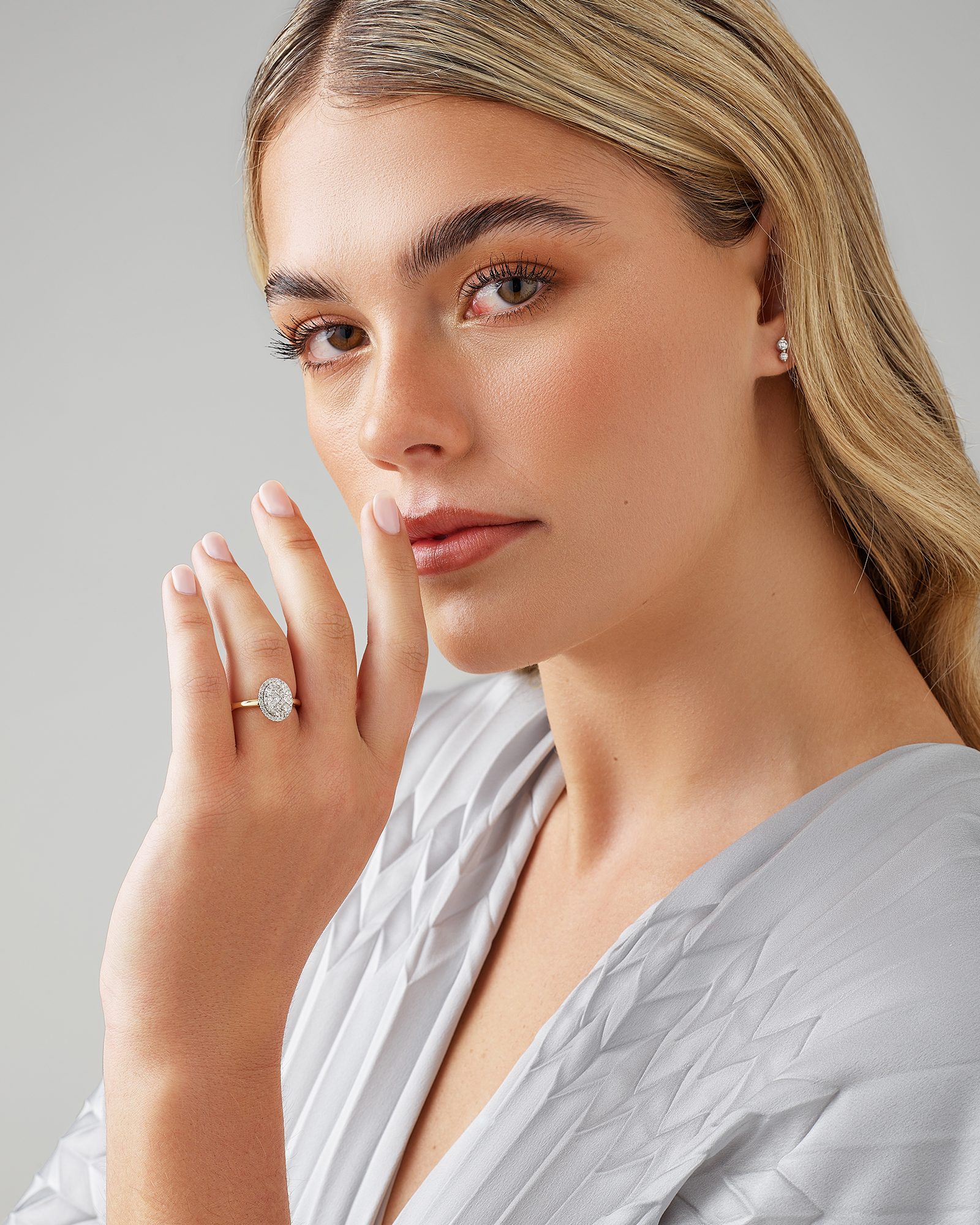 0.50 Carat TW Oval Shaped Diamond Cluster Ring in 14kt Yellow & White Gold