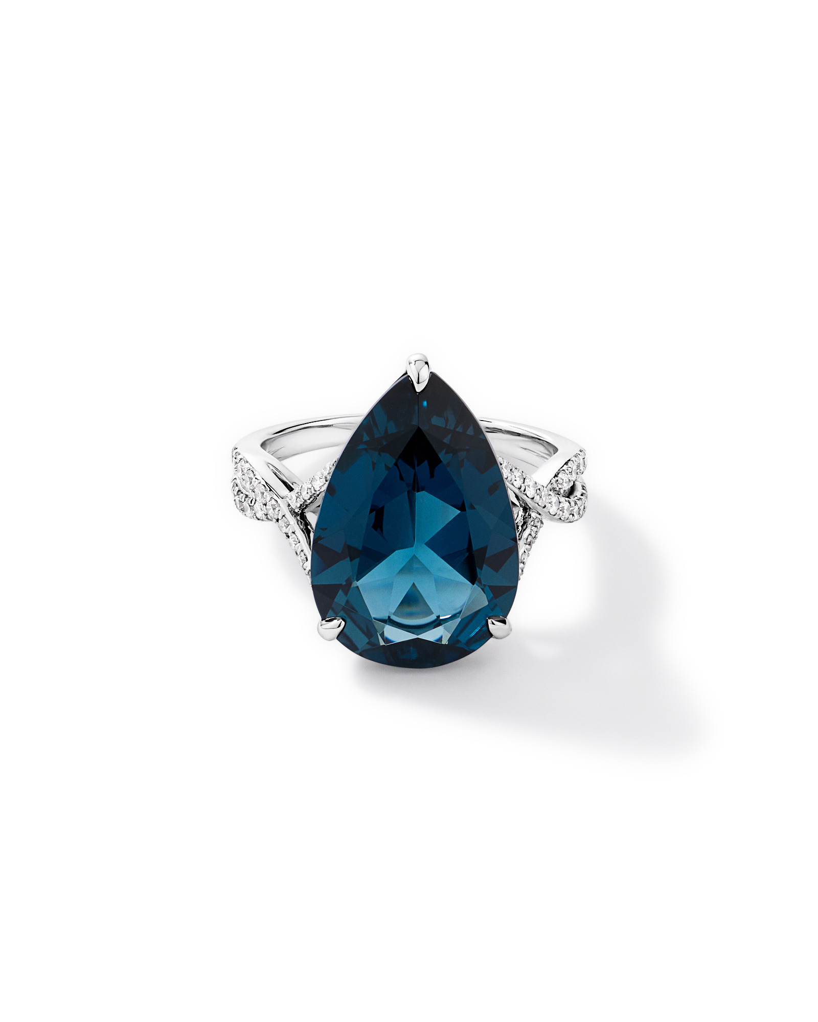 Pear Cut London Blue Topaz & 0.28 Carat TW Diamond Twist Ring 10kt Gold