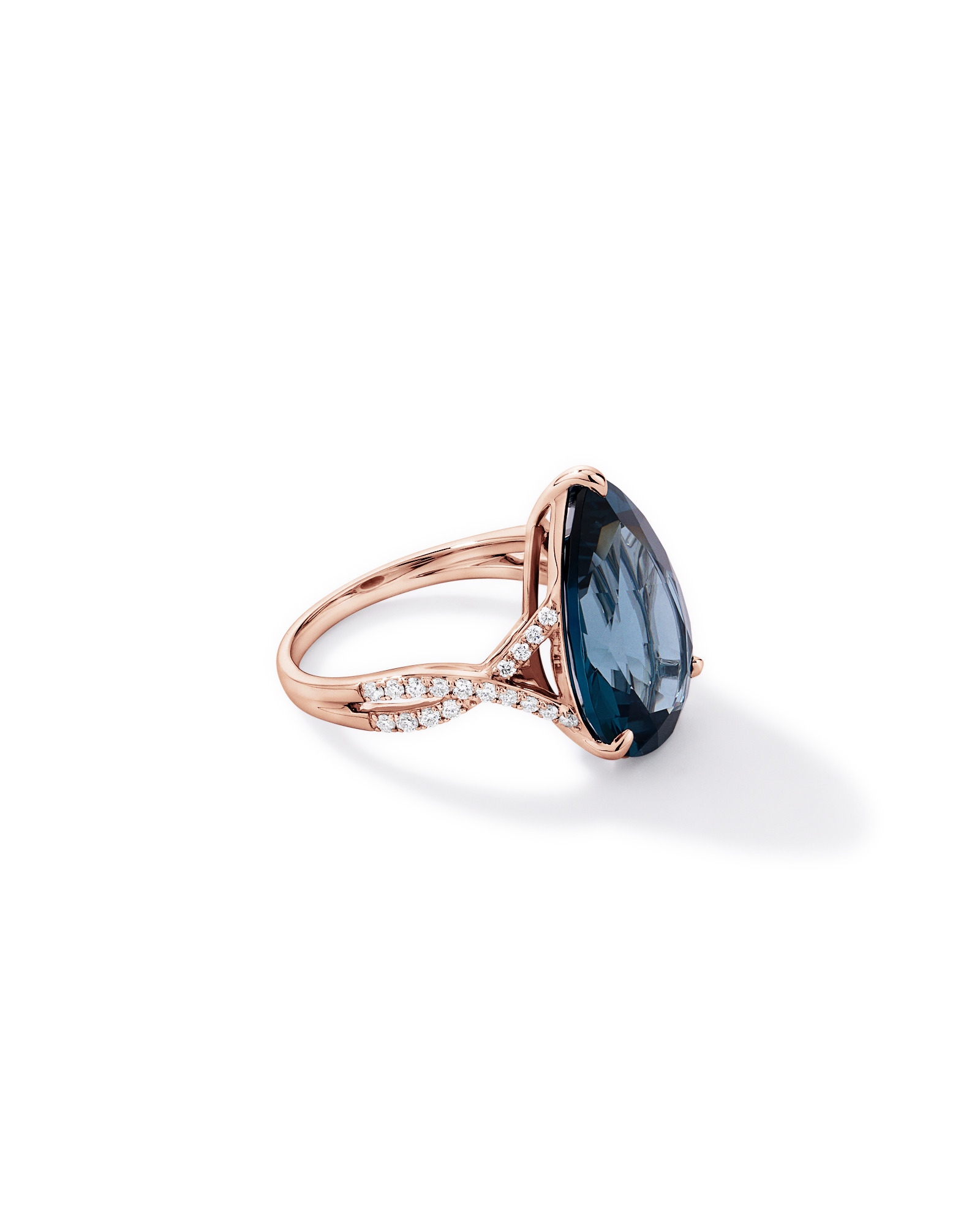 Pear Cut London Blue Topaz & 0.28 Carat TW Diamond Twist Ring 10kt Rose Gold