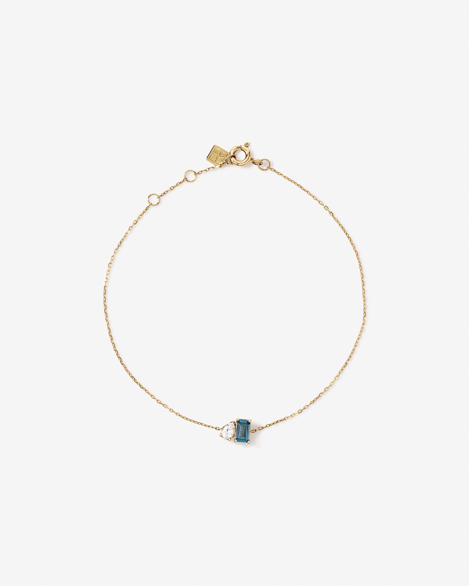 Pear-Cut White Sapphire and Emerald-Cut London Blue Topaz Toi Et Moi Bracelet in 10kt Yellow Gold