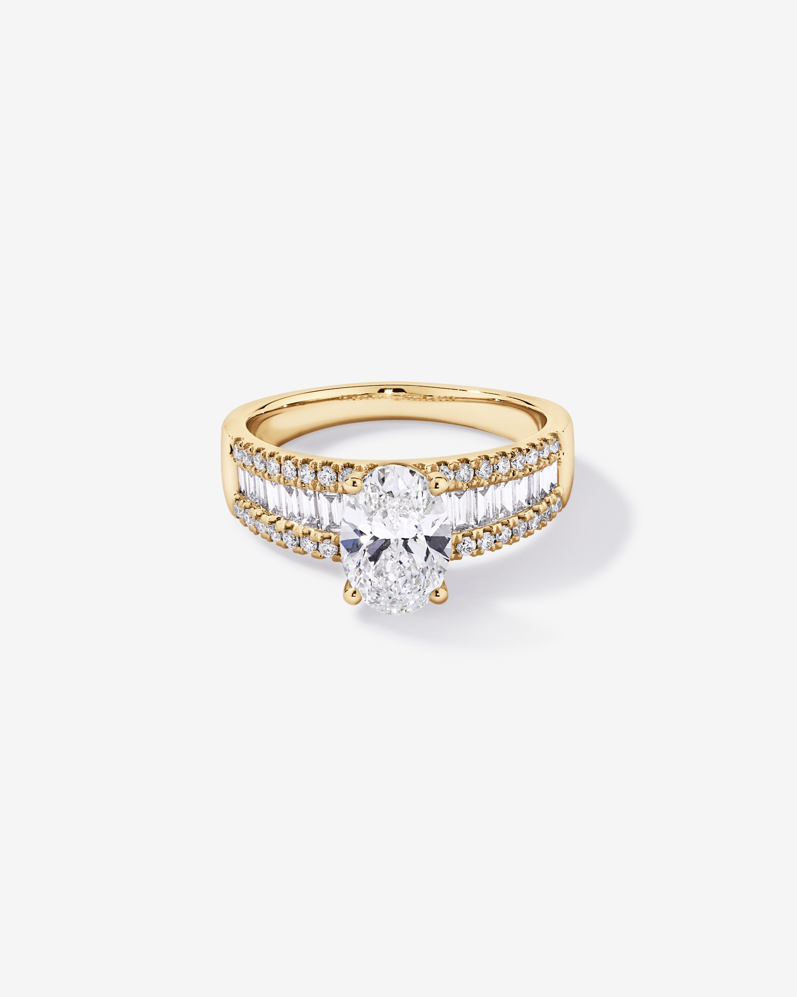 2.21 Carat TW Oval and Baguette Laboratory-Grown Side Accent Diamond Ring 14kt Yellow Gold