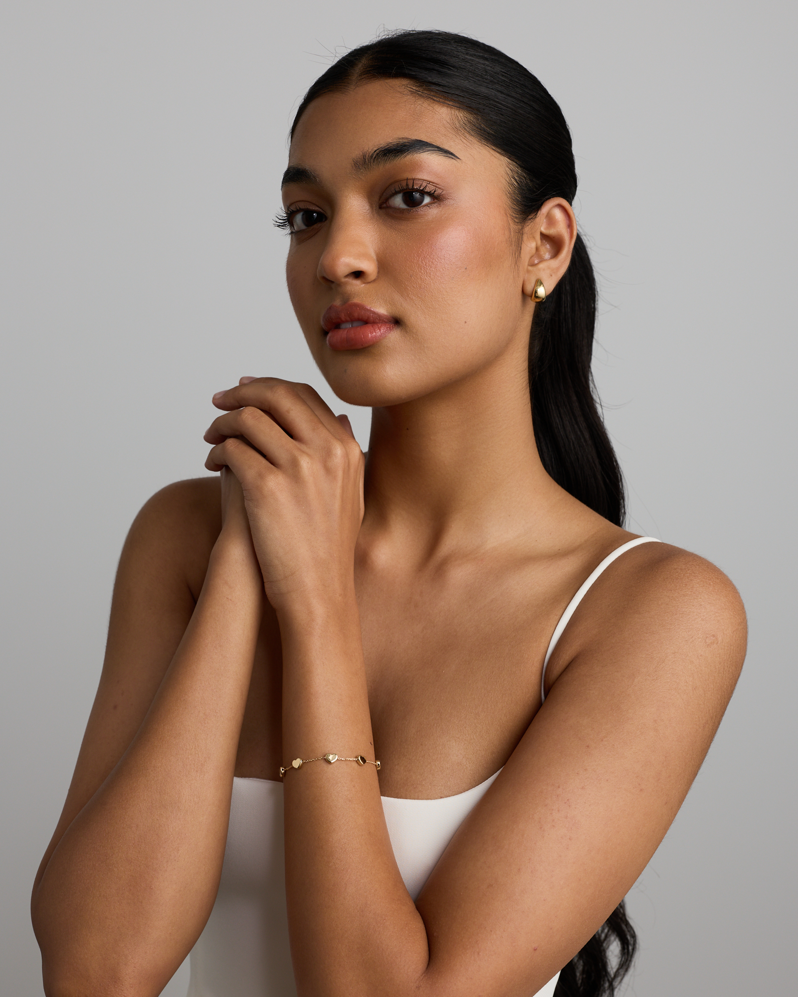 19cm (7.5") Heart Station Bracelet in 10kt Yellow Gold