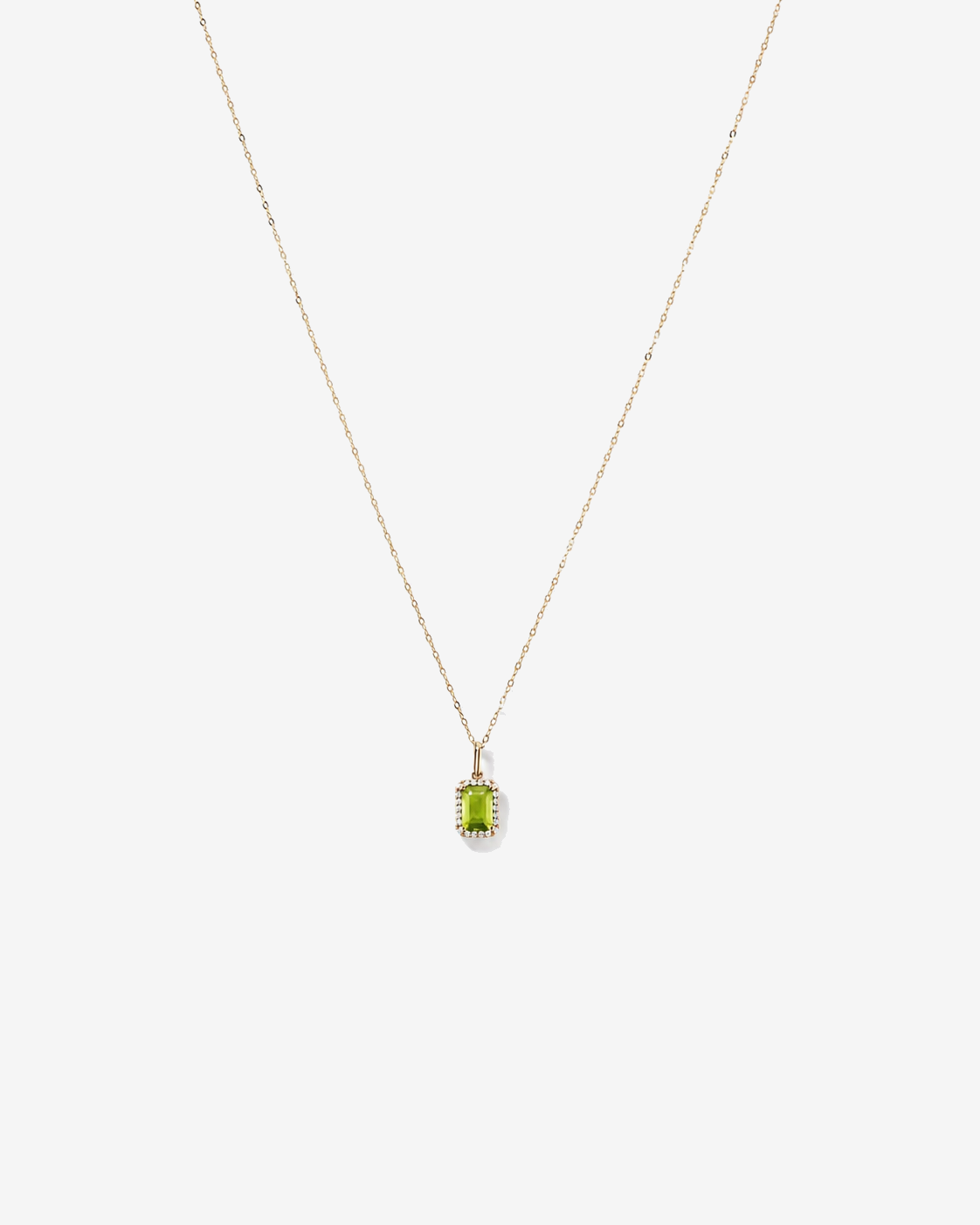 Emerald Cut Peridot and Diamond Halo Pendant with Chain in 10kt Yellow Gold